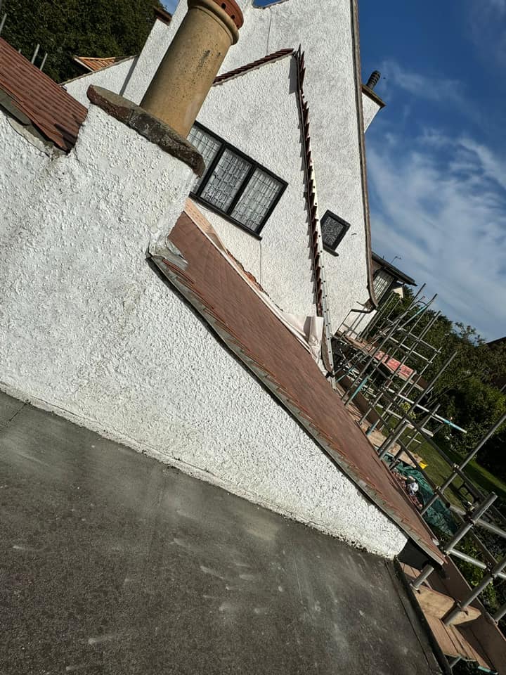 Professional roofers working on a property in London - KS Roof Master