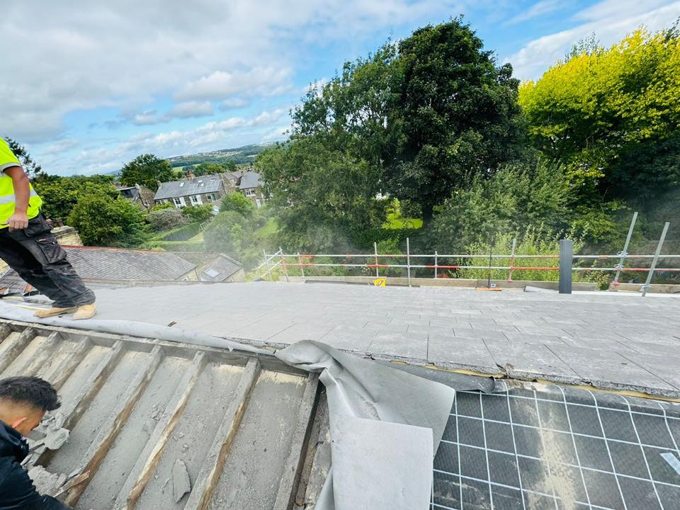 Professional roofers working on a property in London - KS Roof Master