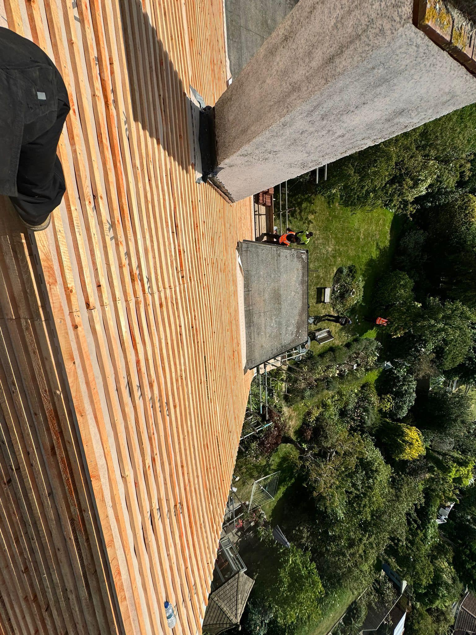 Professional roofers working on a property in London - KS Roof Master
