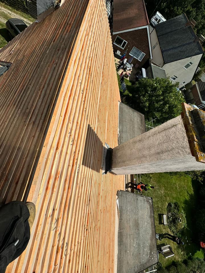 Professional roofers working on a property in London - KS Roof Master