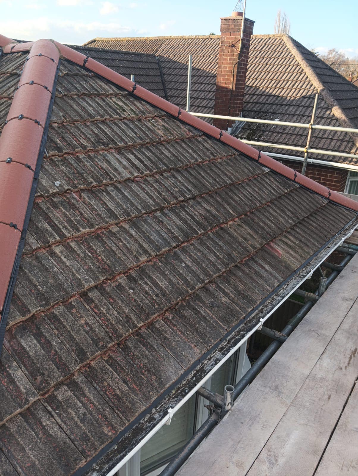 Professional roofers working on a property in London - KS Roof Master
