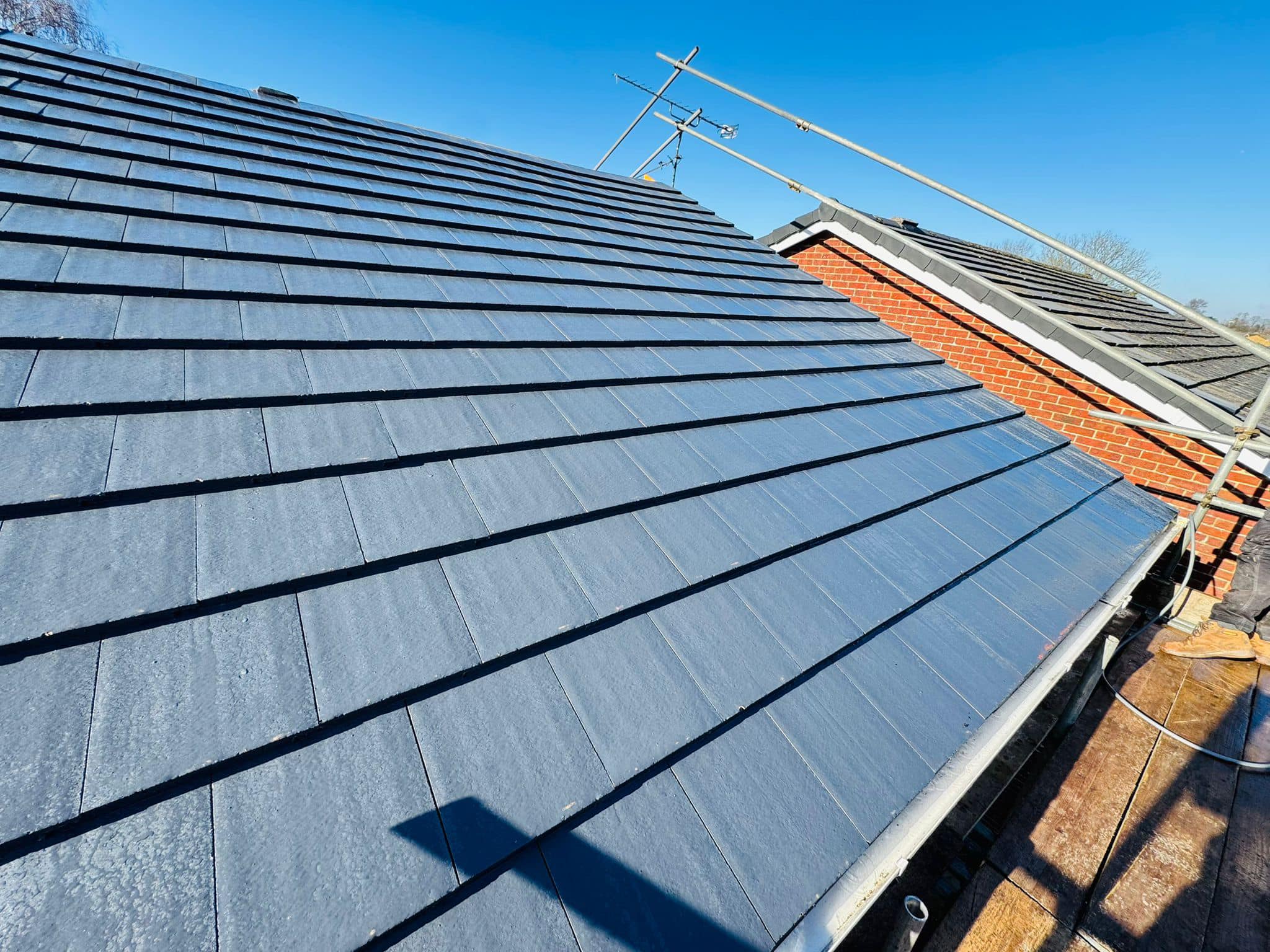 Professional roofers working on a property in London - KS Roof Master