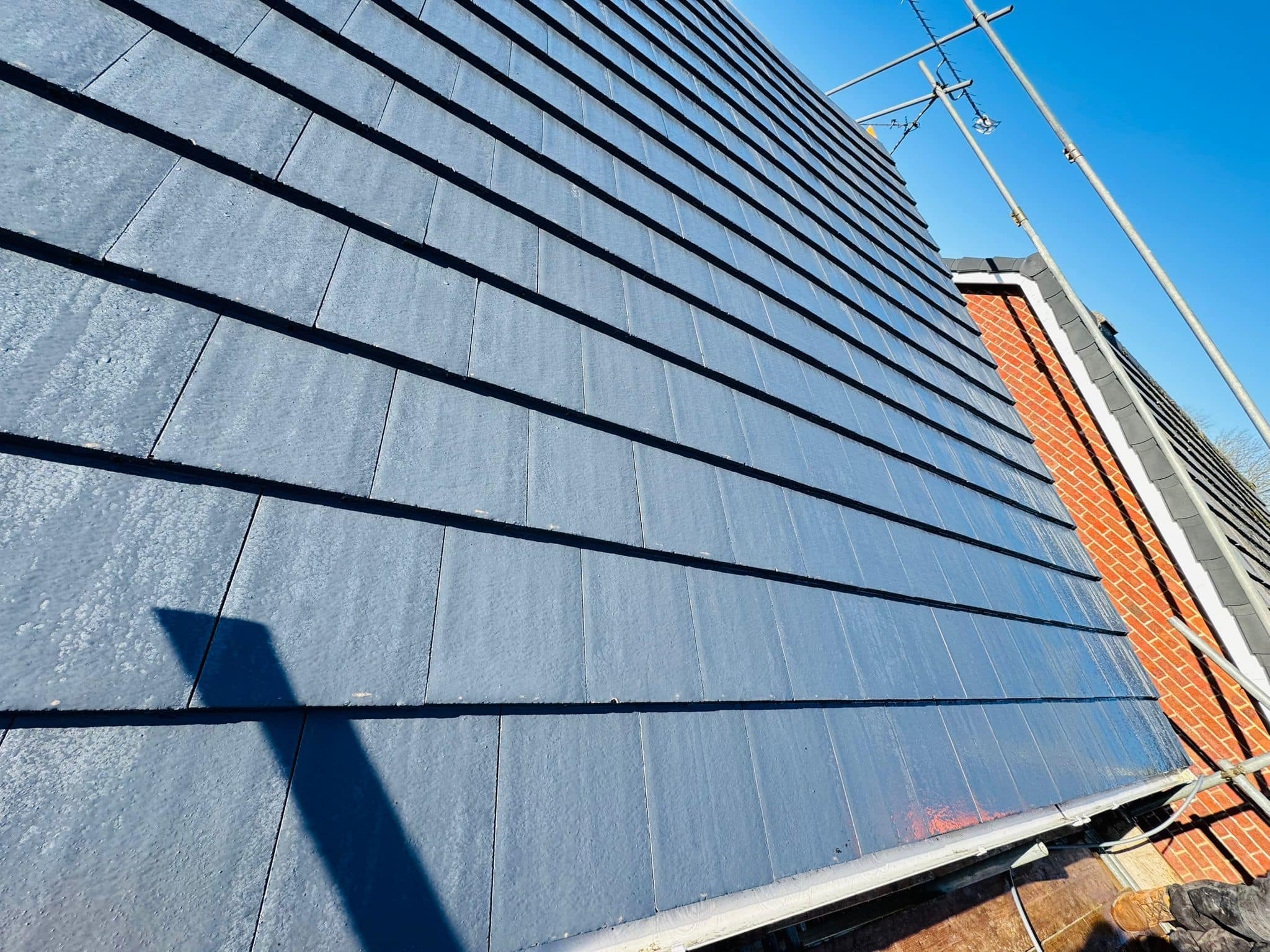 Professional roofers working on a property in London - KS Roof Master