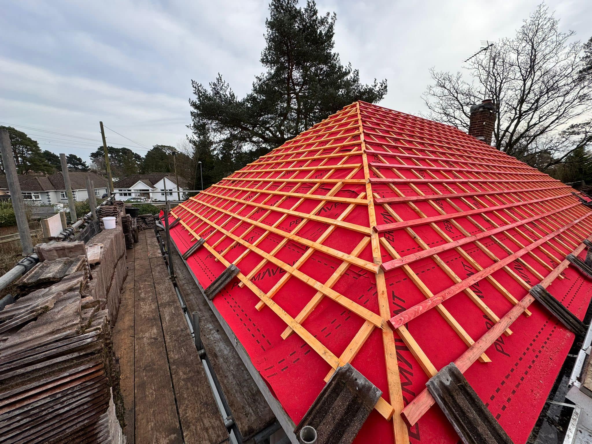 Professional roofers working on a property in London - KS Roof Master