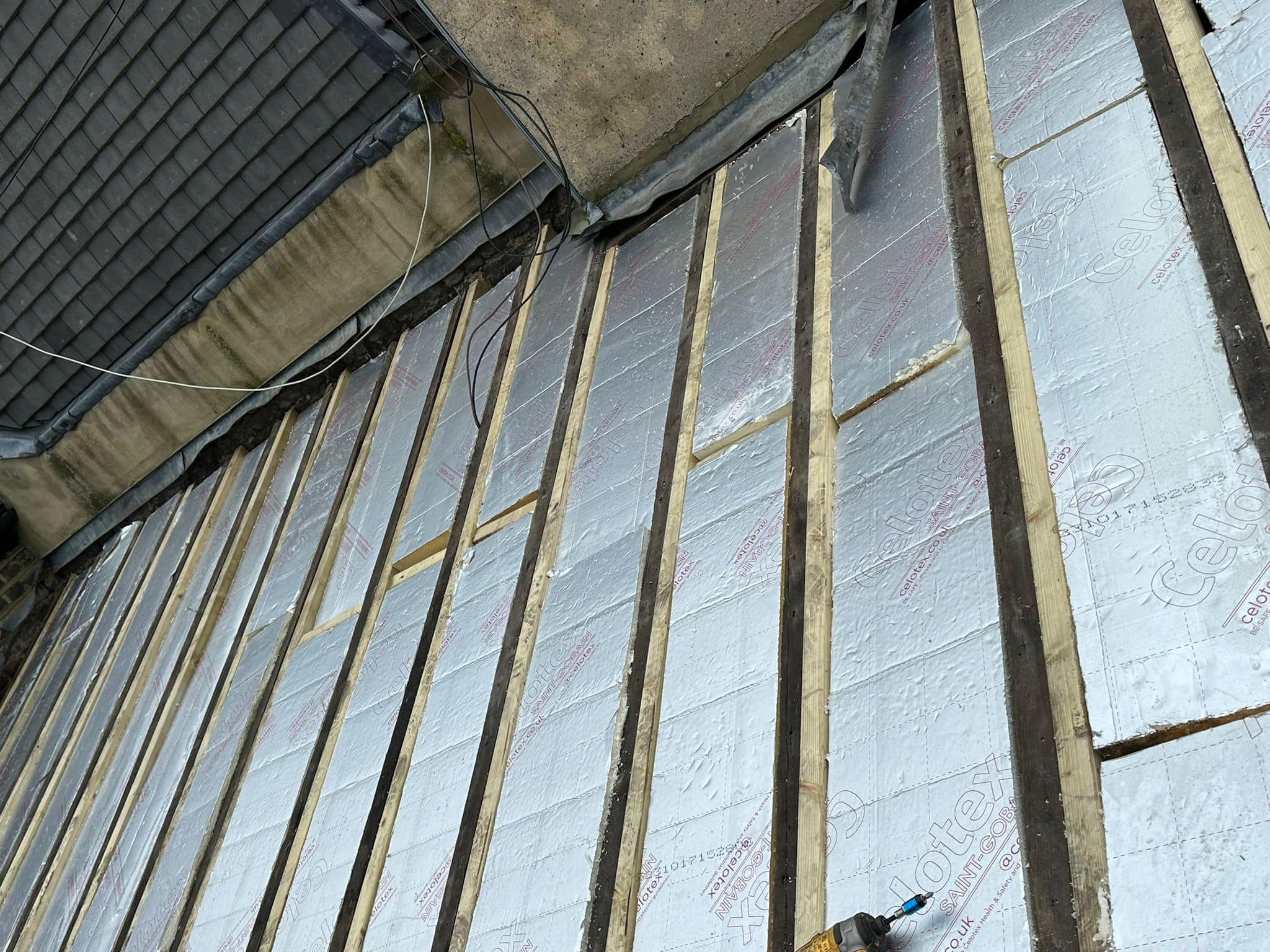 Professional roofers working on a property in London - KS Roof Master