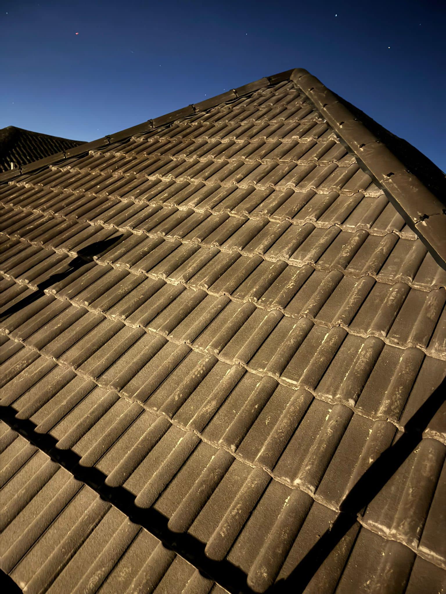 Professional roofers working on a property in London - KS Roof Master