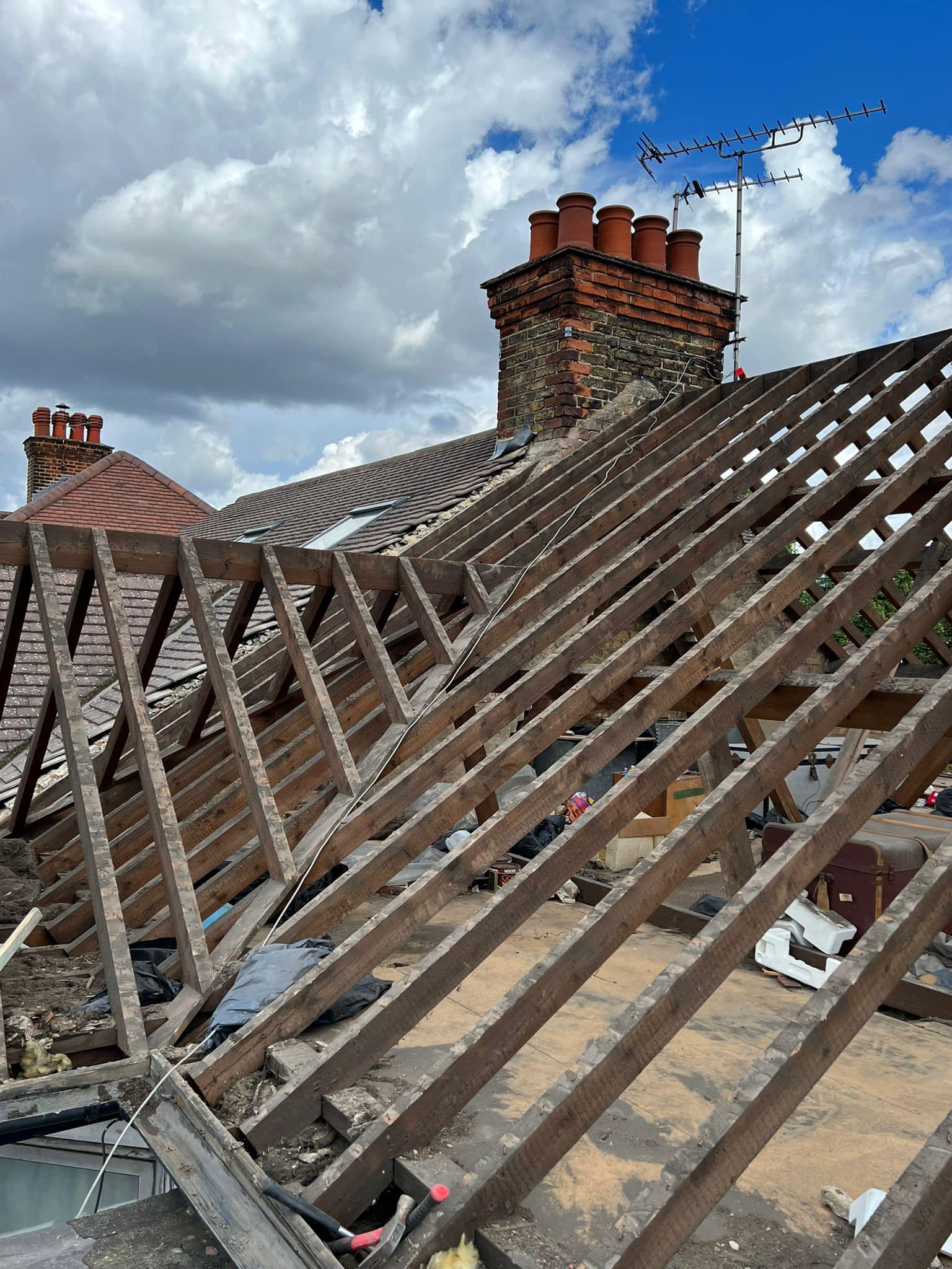 Professional roofers working on a property in London - KS Roof Master