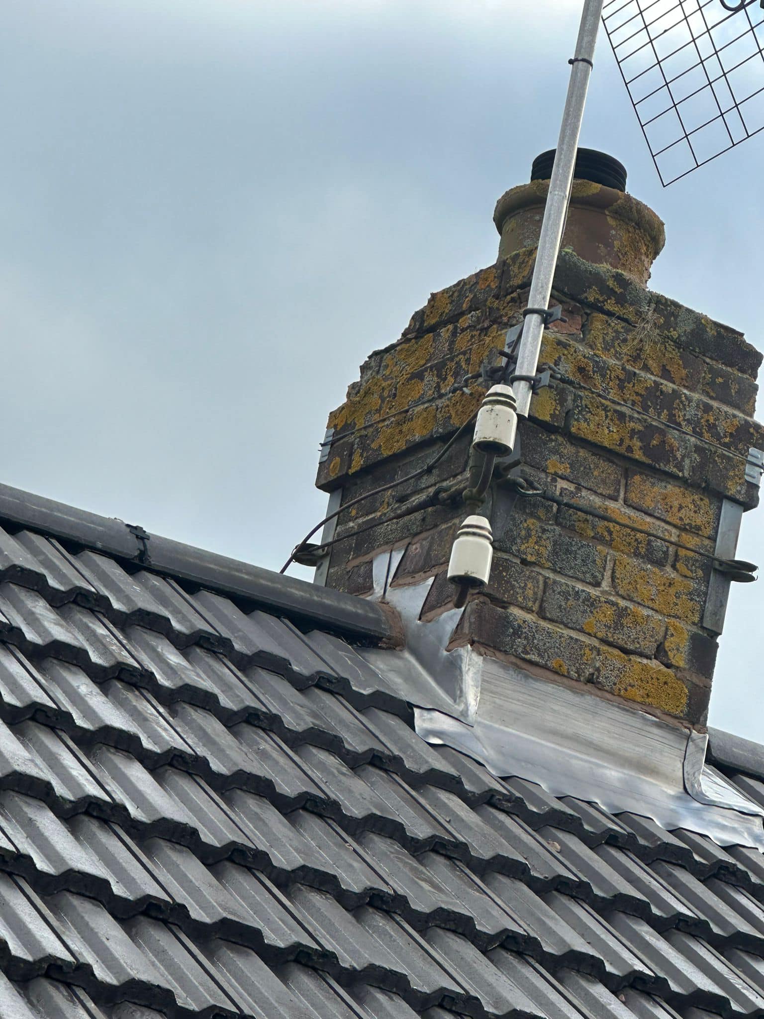 Professional roofers working on a property in London - KS Roof Master