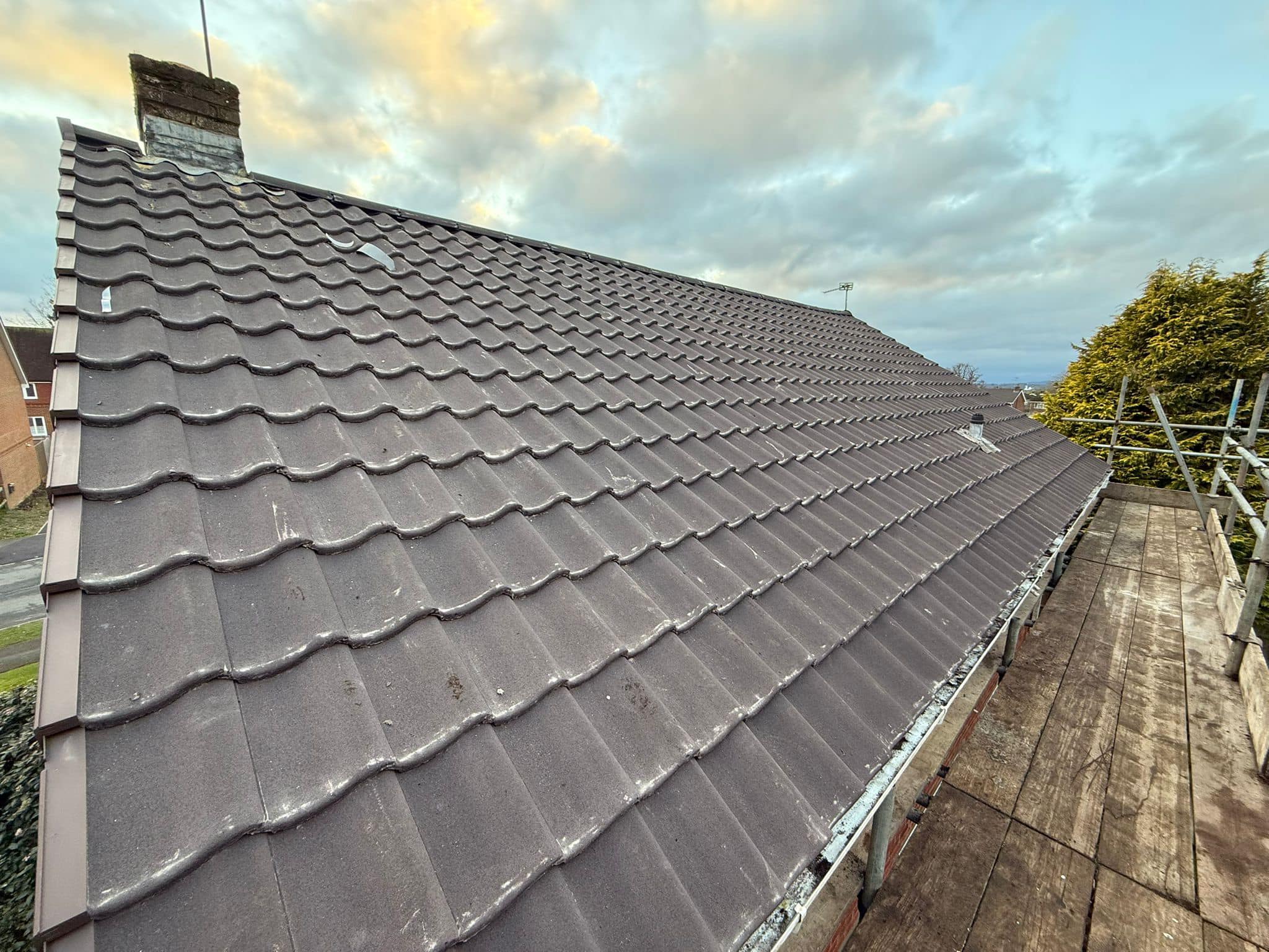 Professional roofers working on a property in London - KS Roof Master