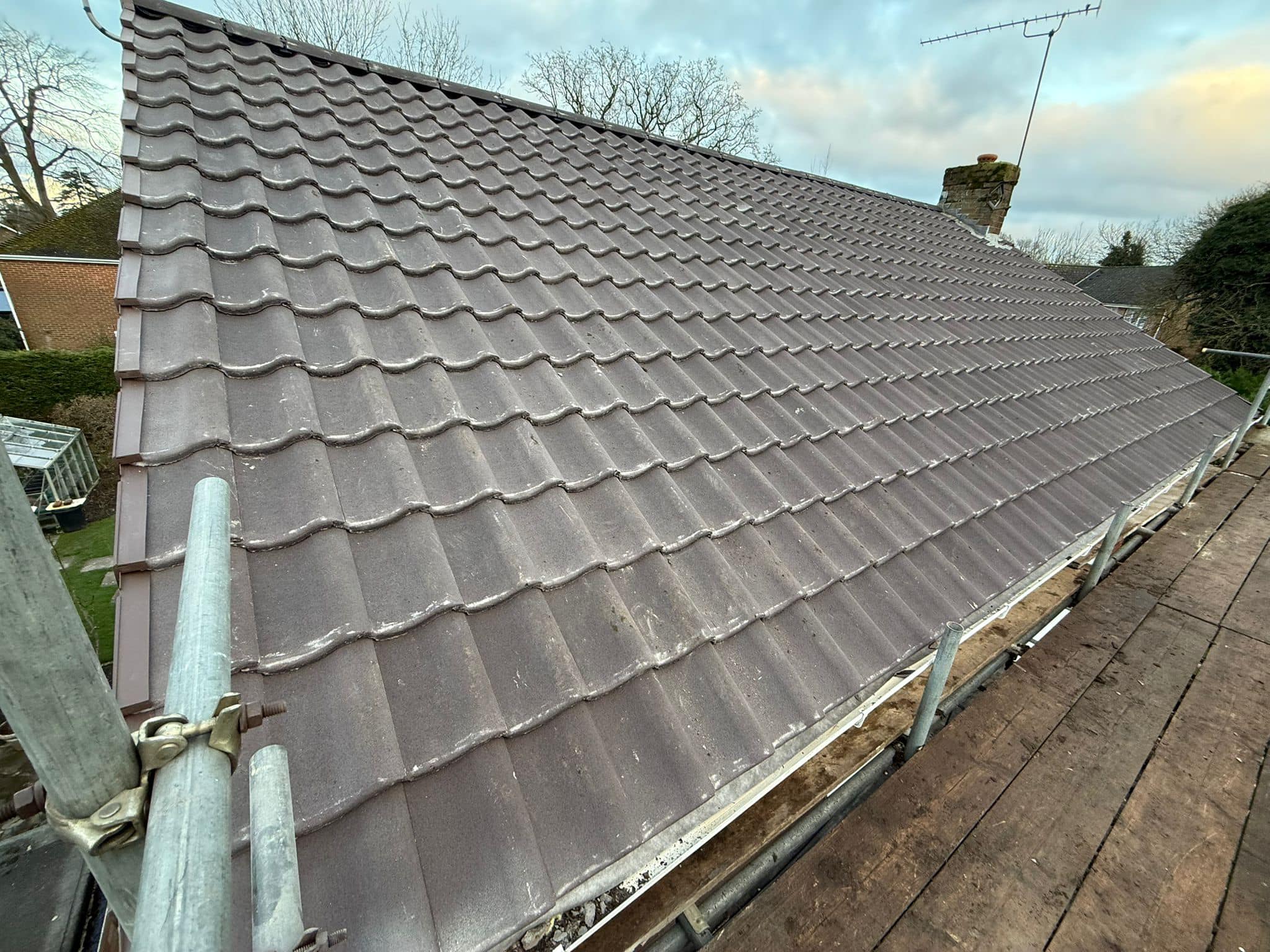 Professional roofers working on a property in London - KS Roof Master