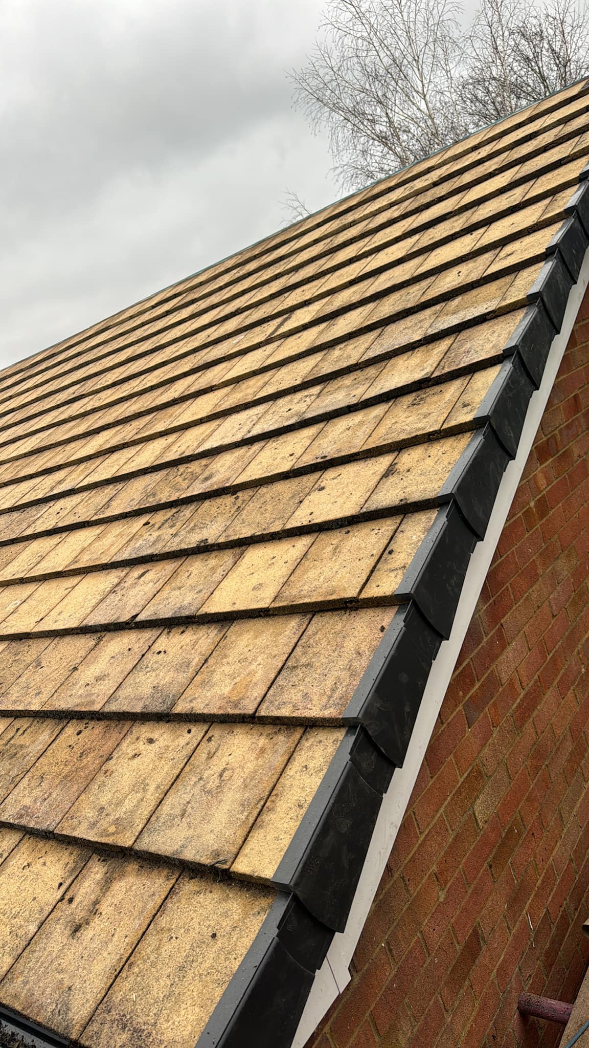 Professional roofers working on a property in London - KS Roof Master