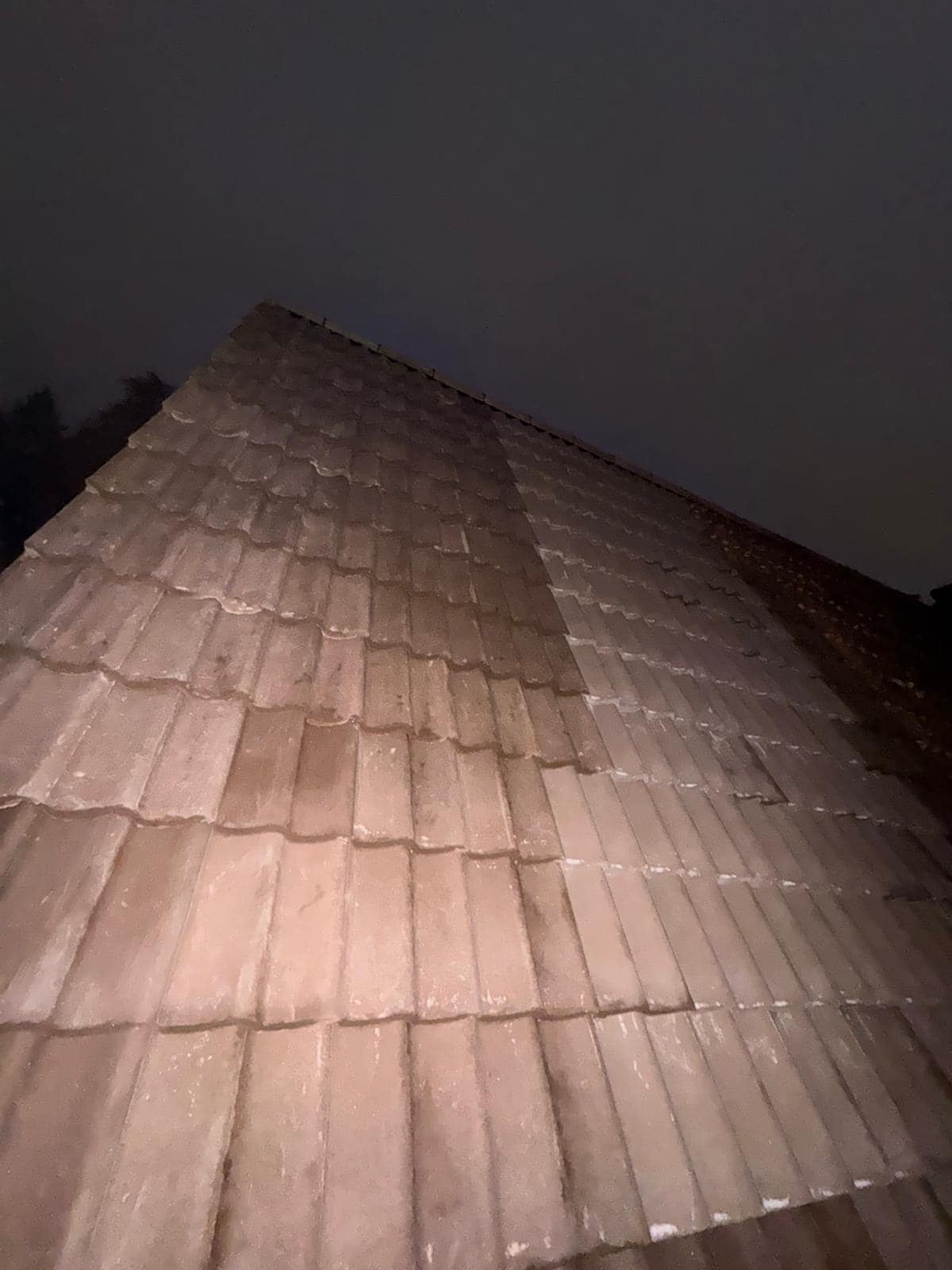Professional roofers working on a property in London - KS Roof Master