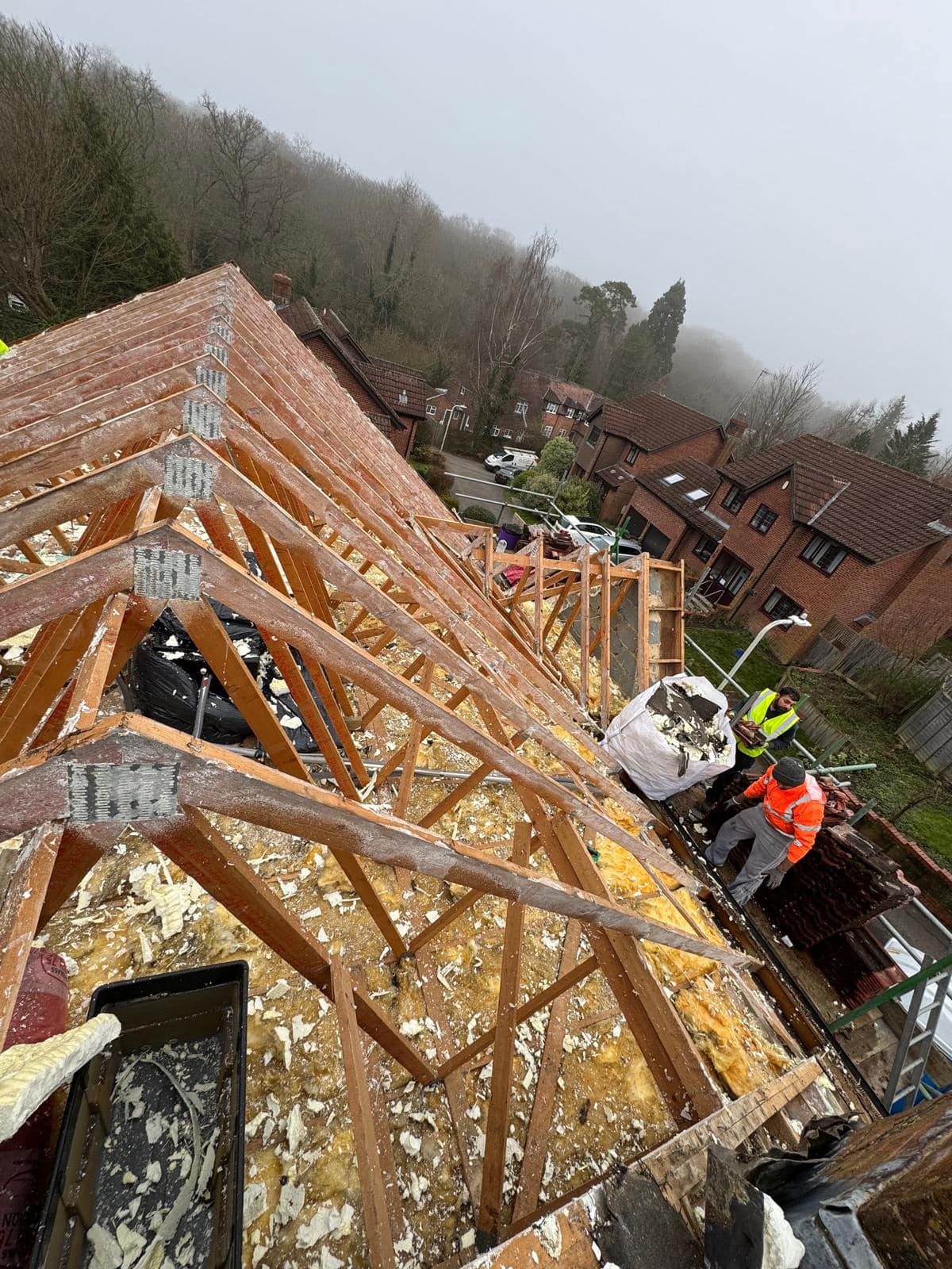Professional roofers working on a property in London - KS Roof Master
