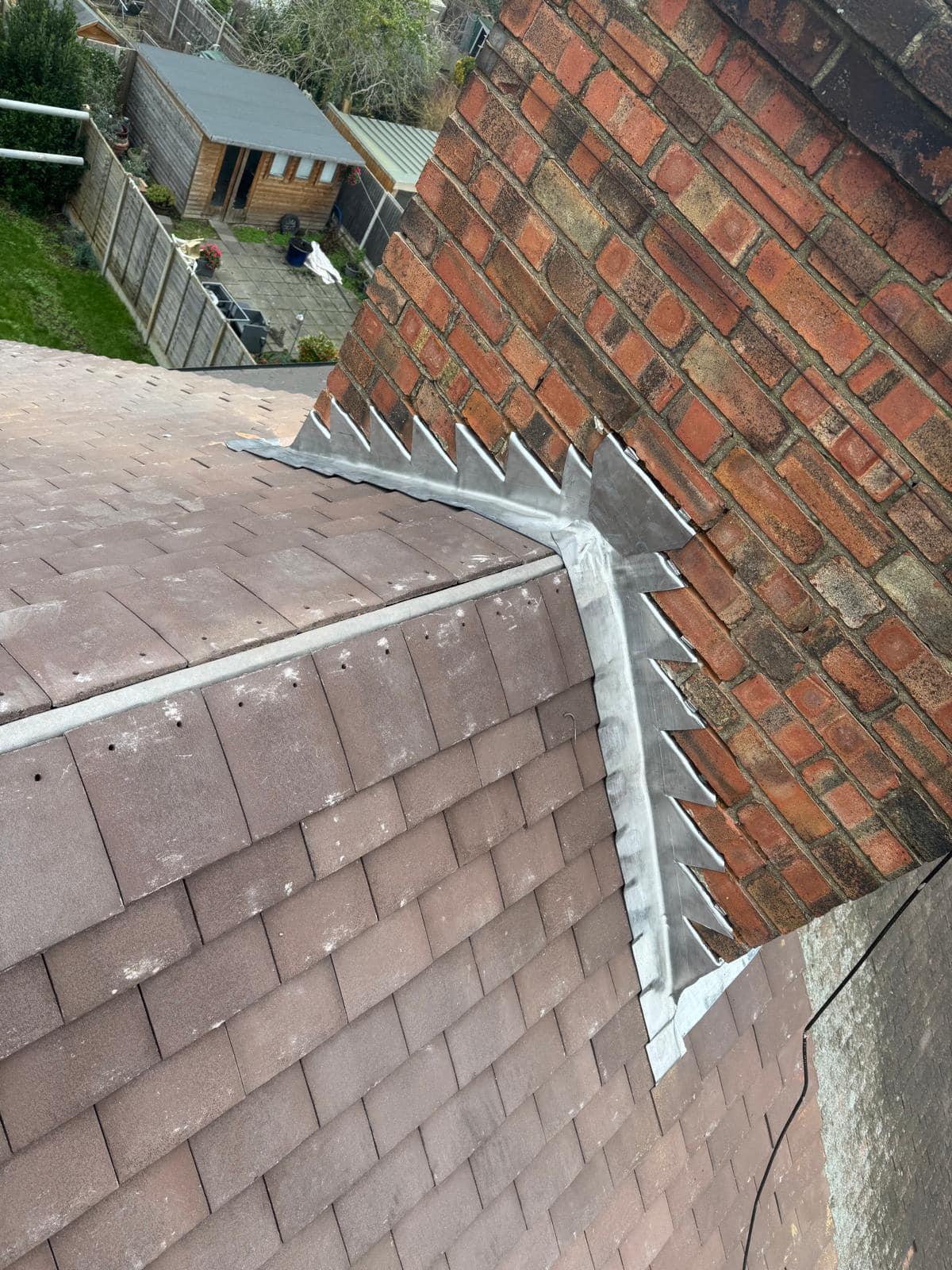 Professional roofers working on a property in London - KS Roof Master