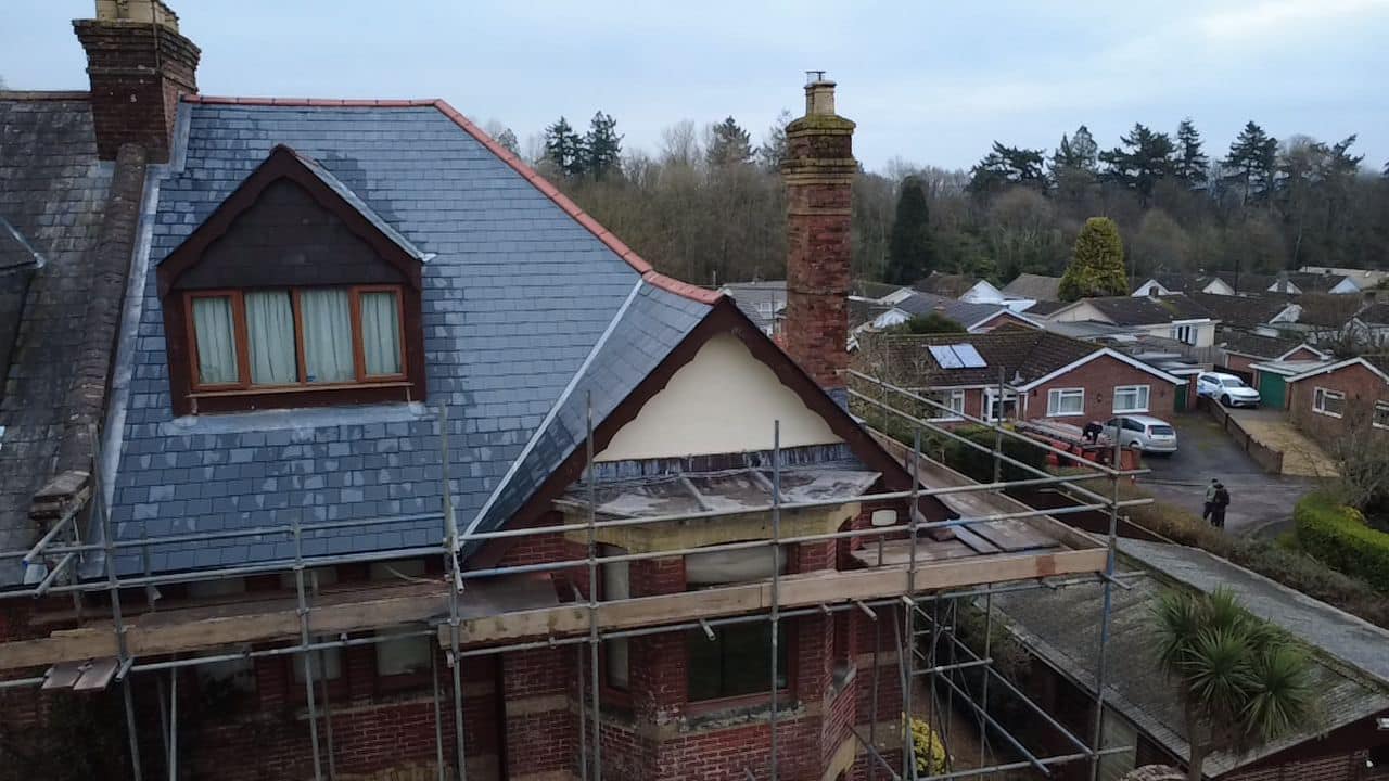 Professional roofers working on a property in London - KS Roof Master