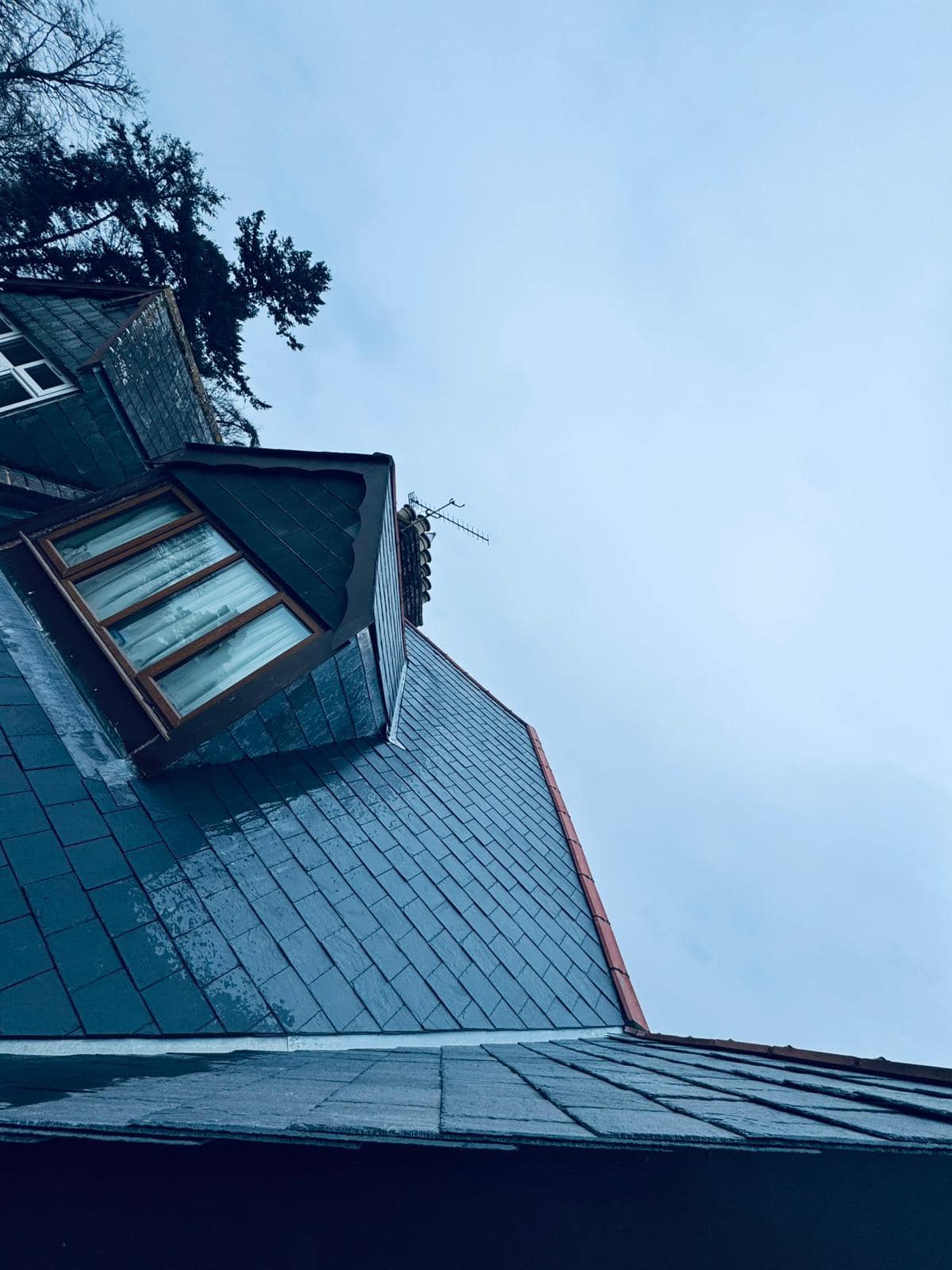 Professional roofers working on a property in London - KS Roof Master