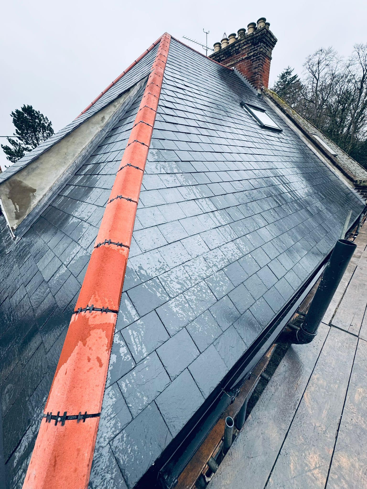 Professional roofers working on a property in London - KS Roof Master
