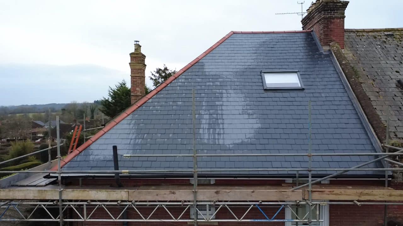 Professional roofers working on a property in London - KS Roof Master