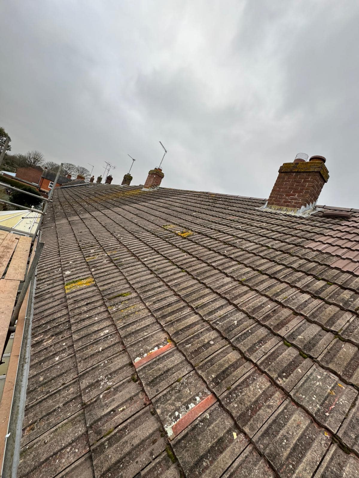 Professional roofers working on a property in London - KS Roof Master