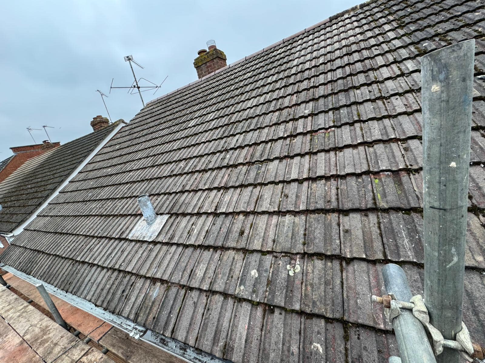 Professional roofers working on a property in London - KS Roof Master