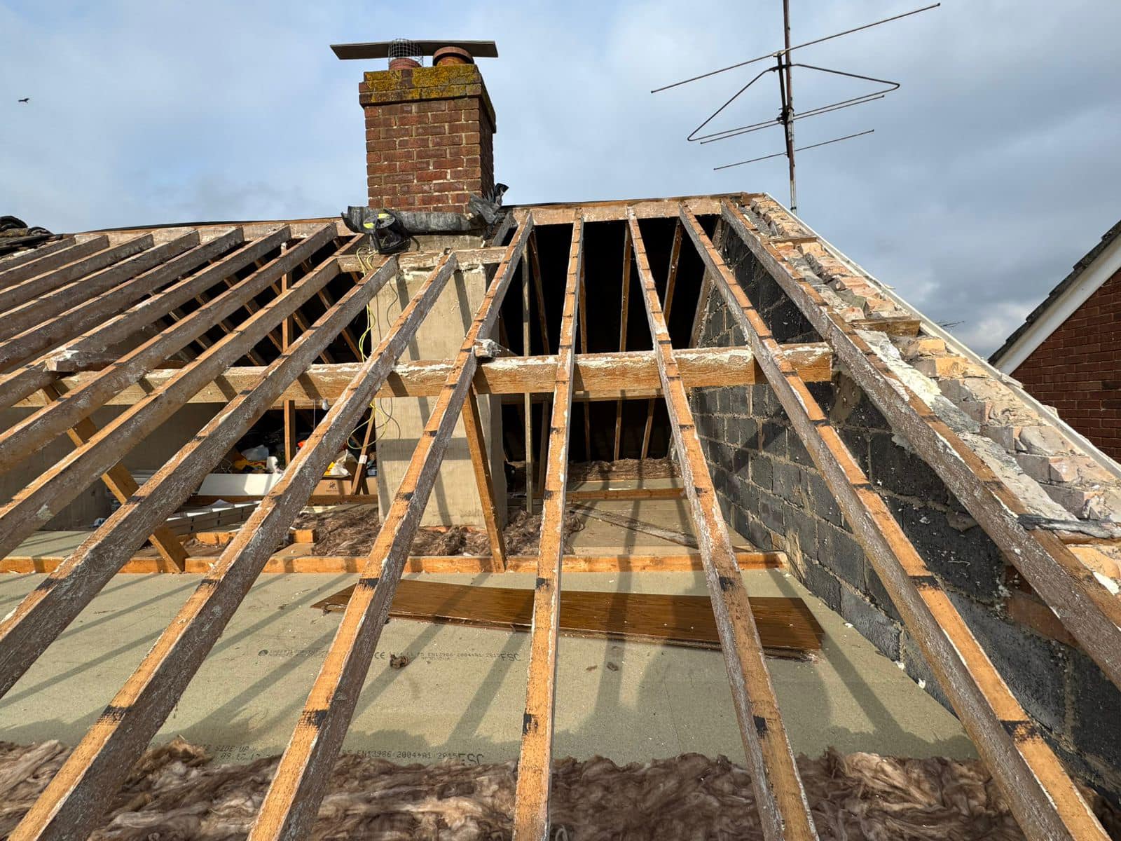 Professional roofers working on a property in London - KS Roof Master