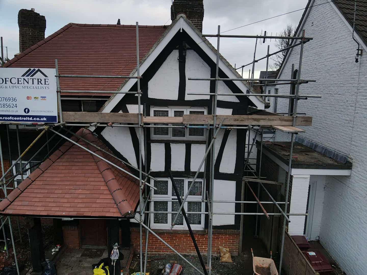 Professional roofers working on a property in London - KS Roof Master