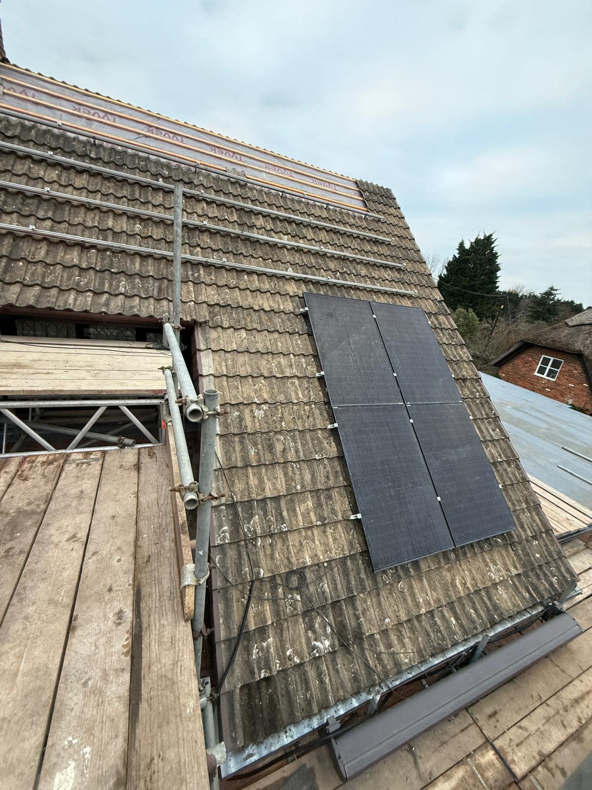 Professional roofers working on a property in London - KS Roof Master