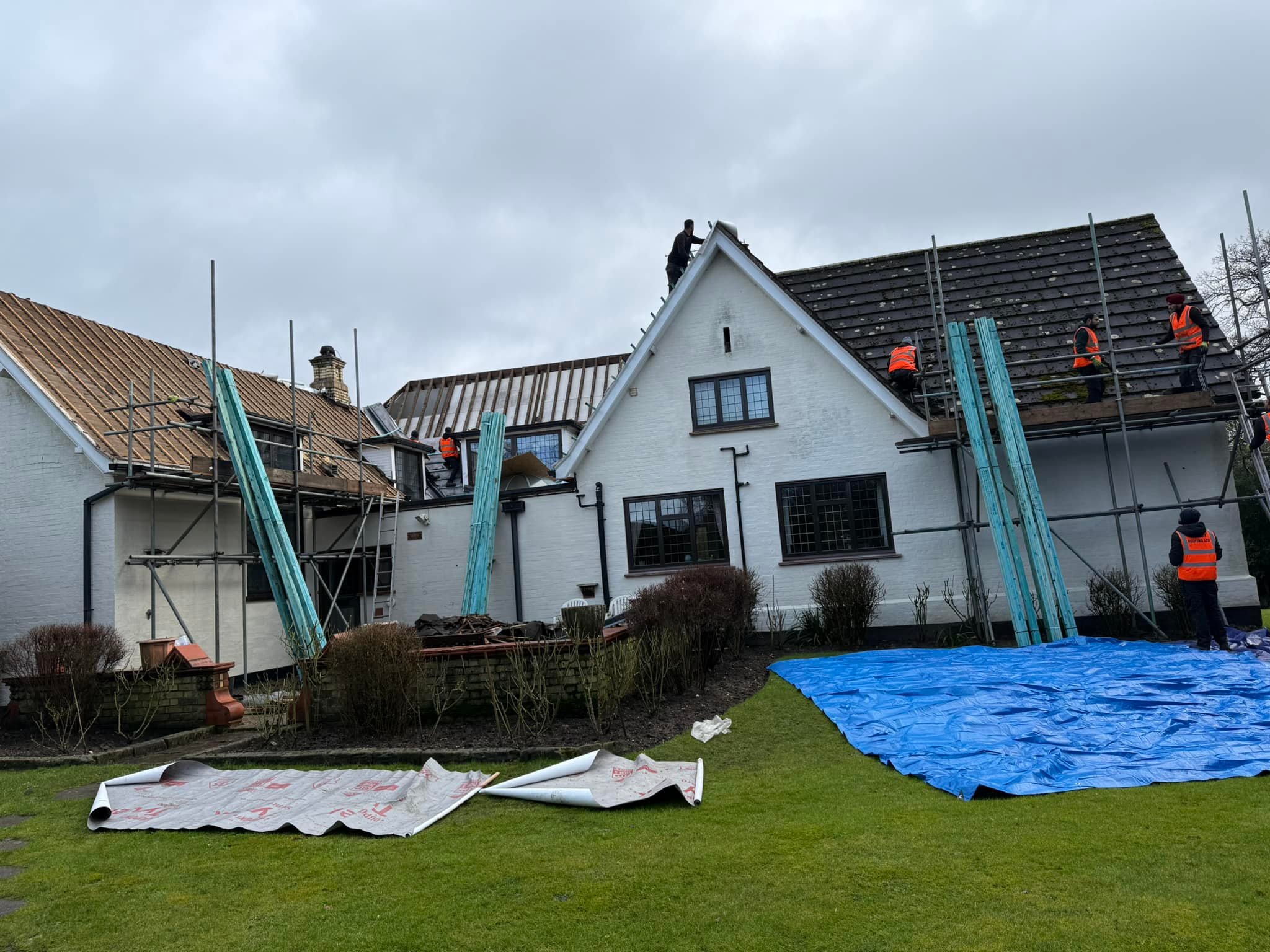 Professional roofers working on a property in London - KS Roof Master