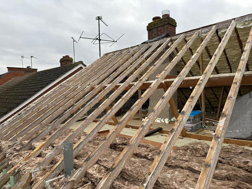 Professional roofers working on a property in London - KS Roof Master