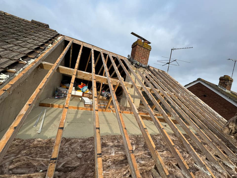 Professional roofers working on a property in London - KS Roof Master
