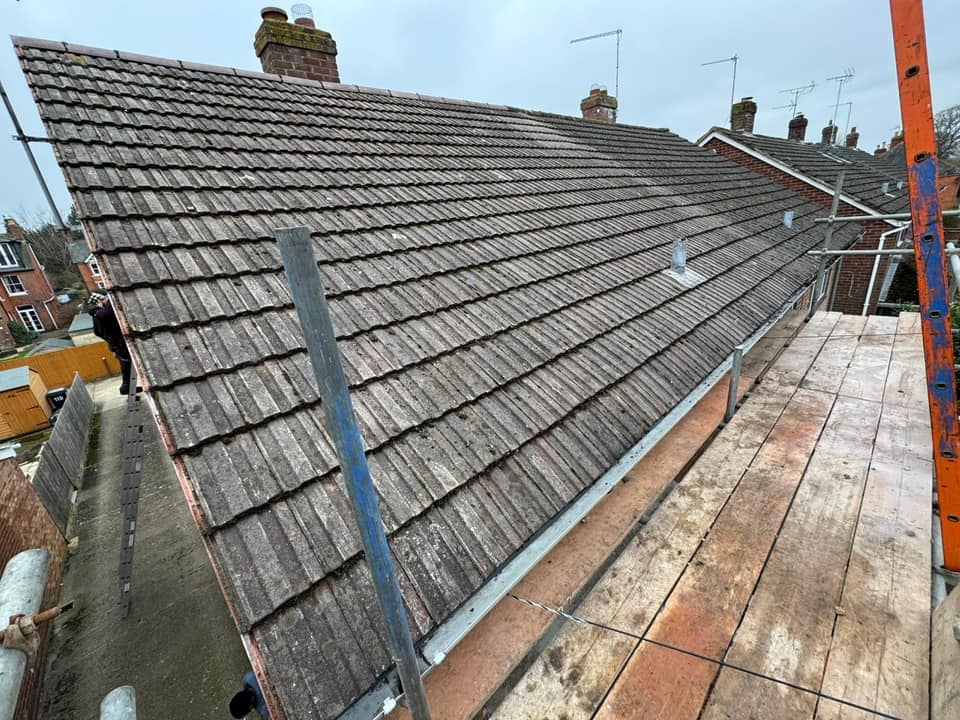 Professional roofers working on a property in London - KS Roof Master