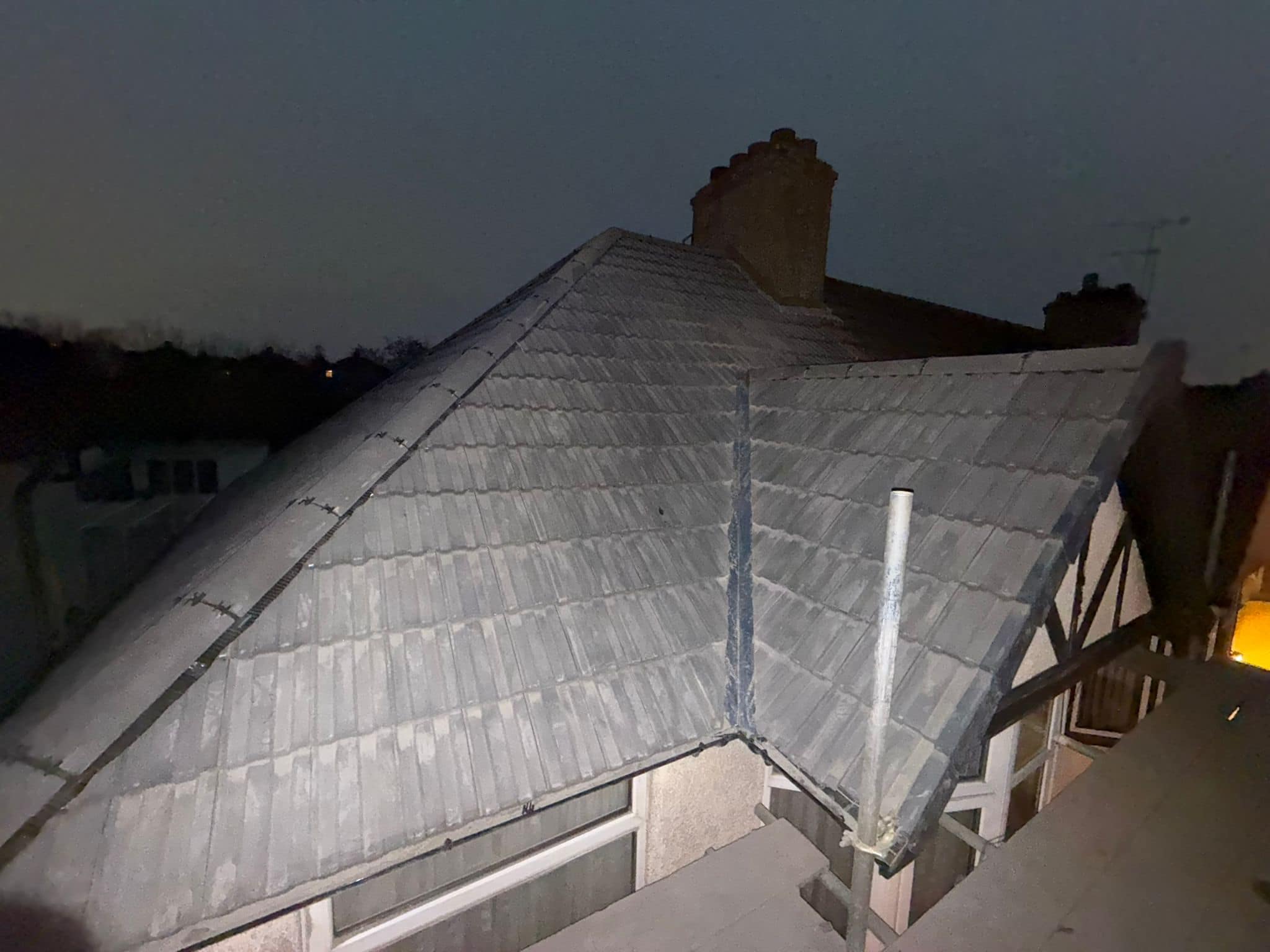 Professional roofers working on a property in London - KS Roof Master