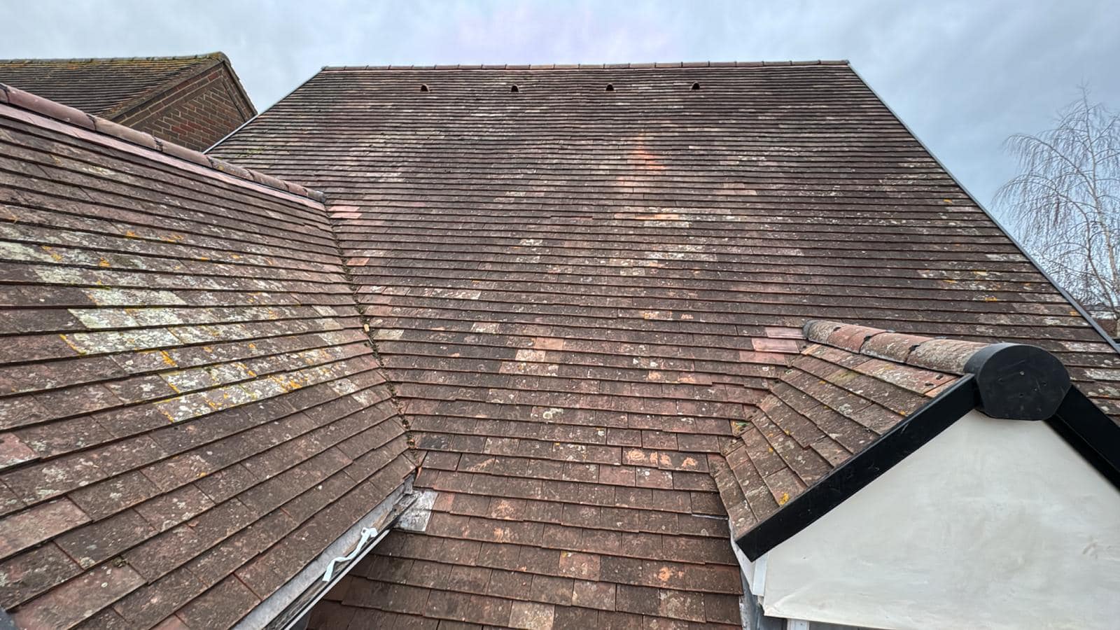 Professional roofers working on a property in London - KS Roof Master