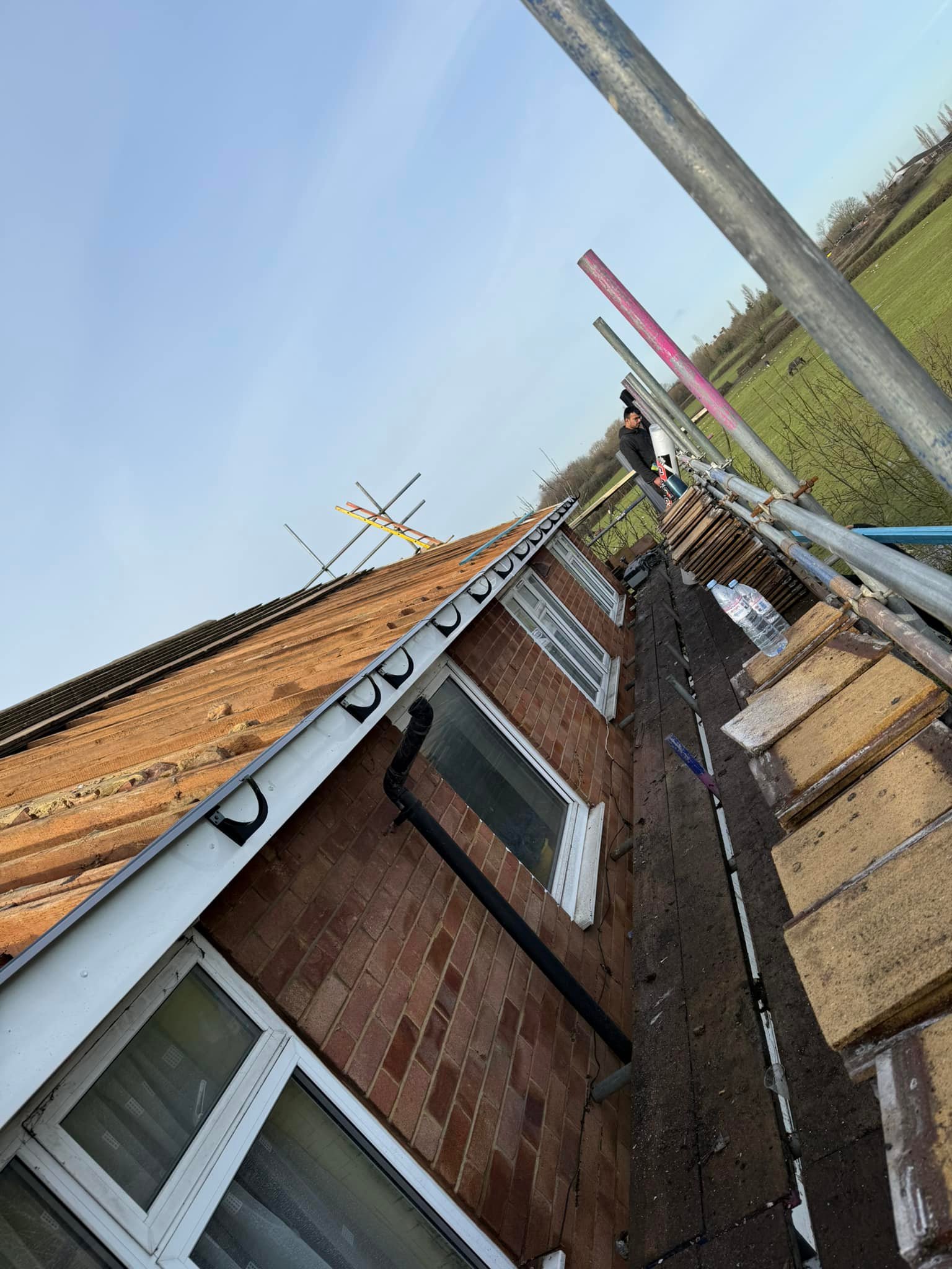 Professional roofers working on a property in London - KS Roof Master