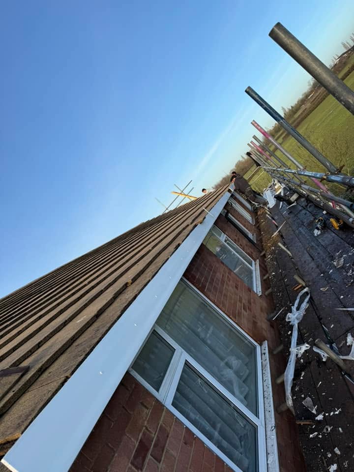 Professional roofers working on a property in London - KS Roof Master