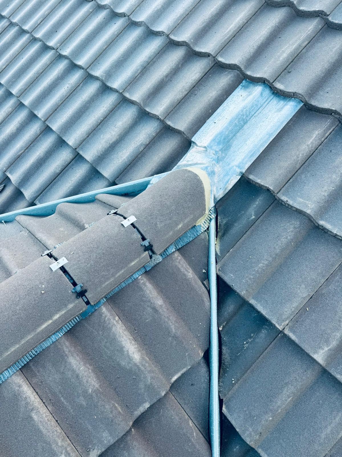 Professional roofers working on a property in London - KS Roof Master