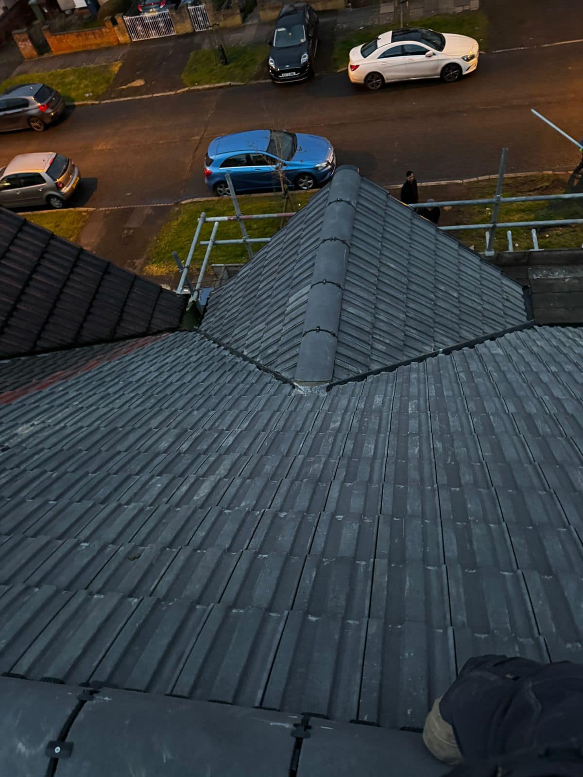 Professional roofers working on a property in London - KS Roof Master