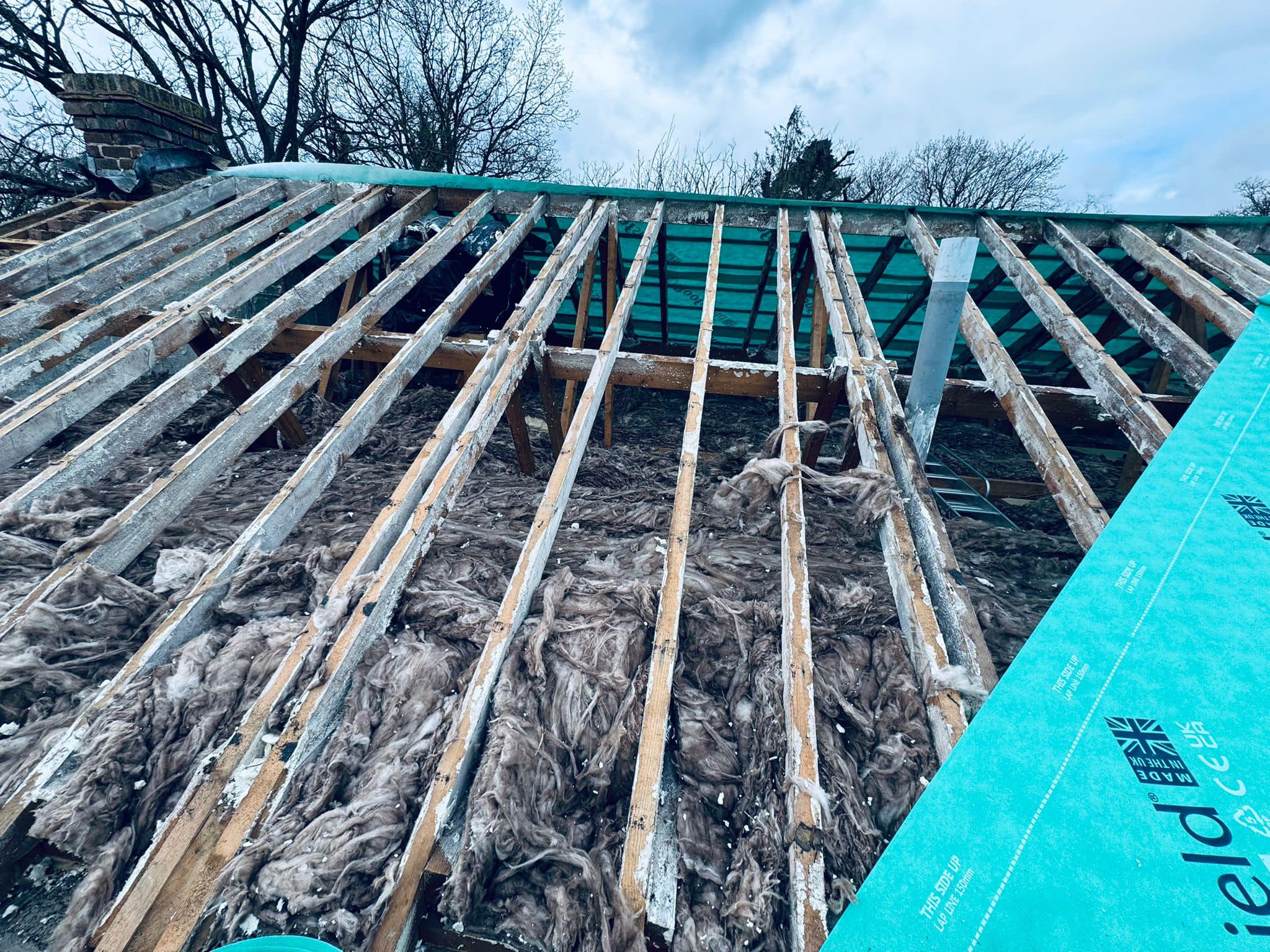 Professional roofers working on a property in London - KS Roof Master