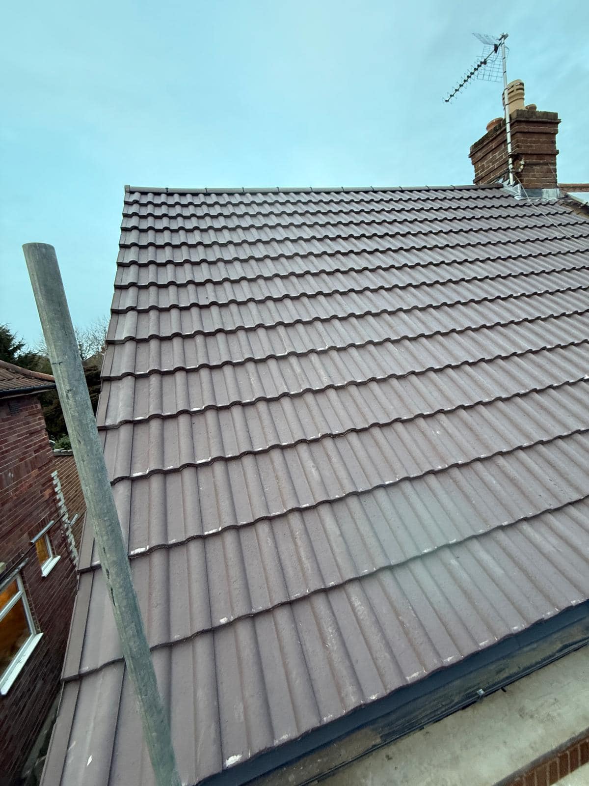 Professional roofers working on a property in London - KS Roof Master