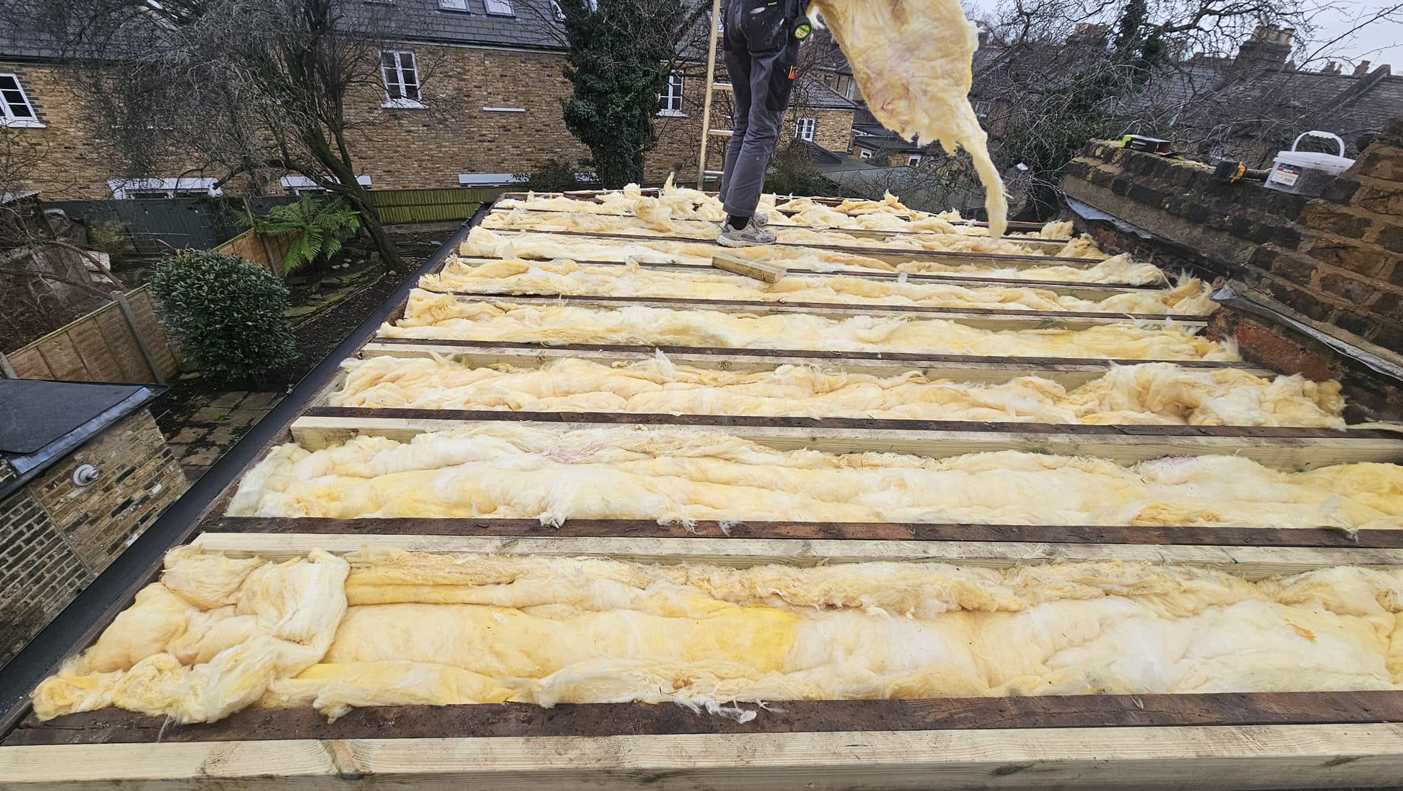 Professional roofers working on a property in London - KS Roof Master