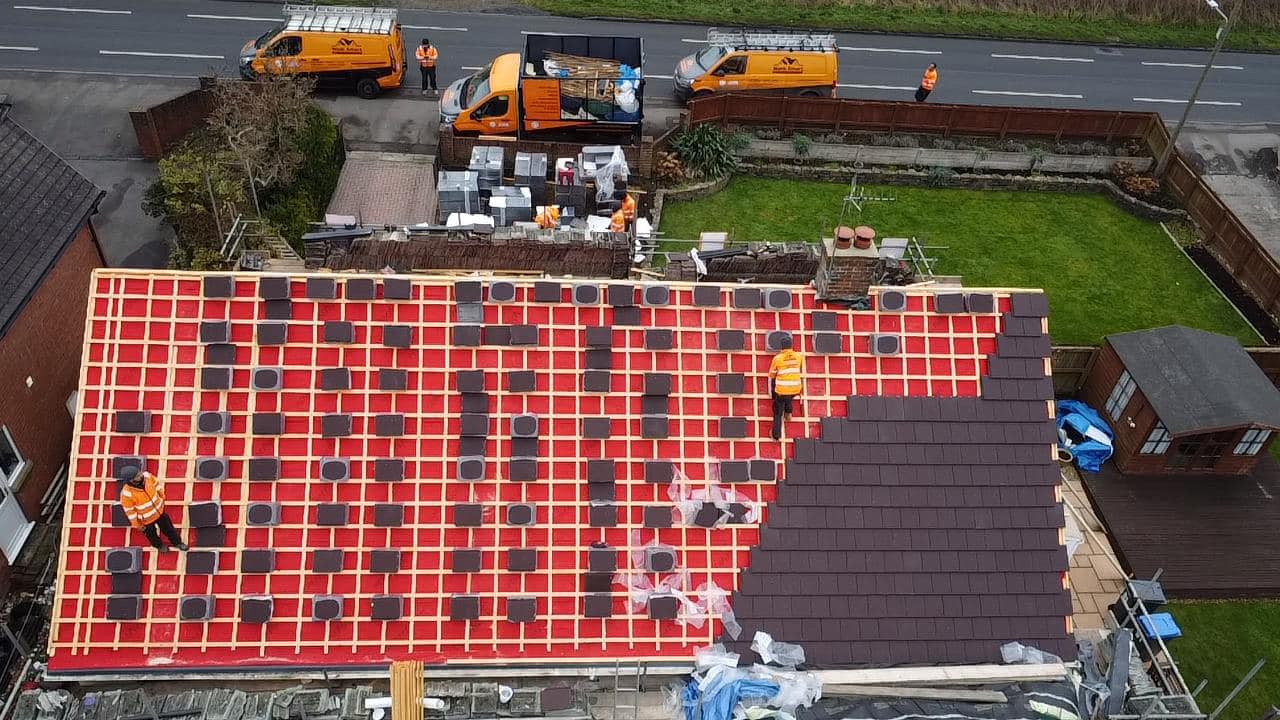 Professional roofers working on a property in London - KS Roof Master