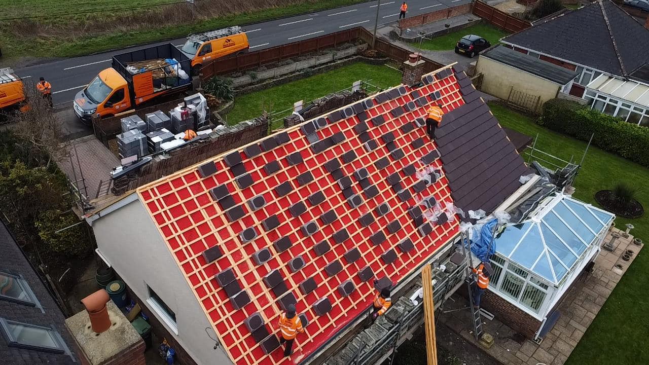 Professional roofers working on a property in London - KS Roof Master