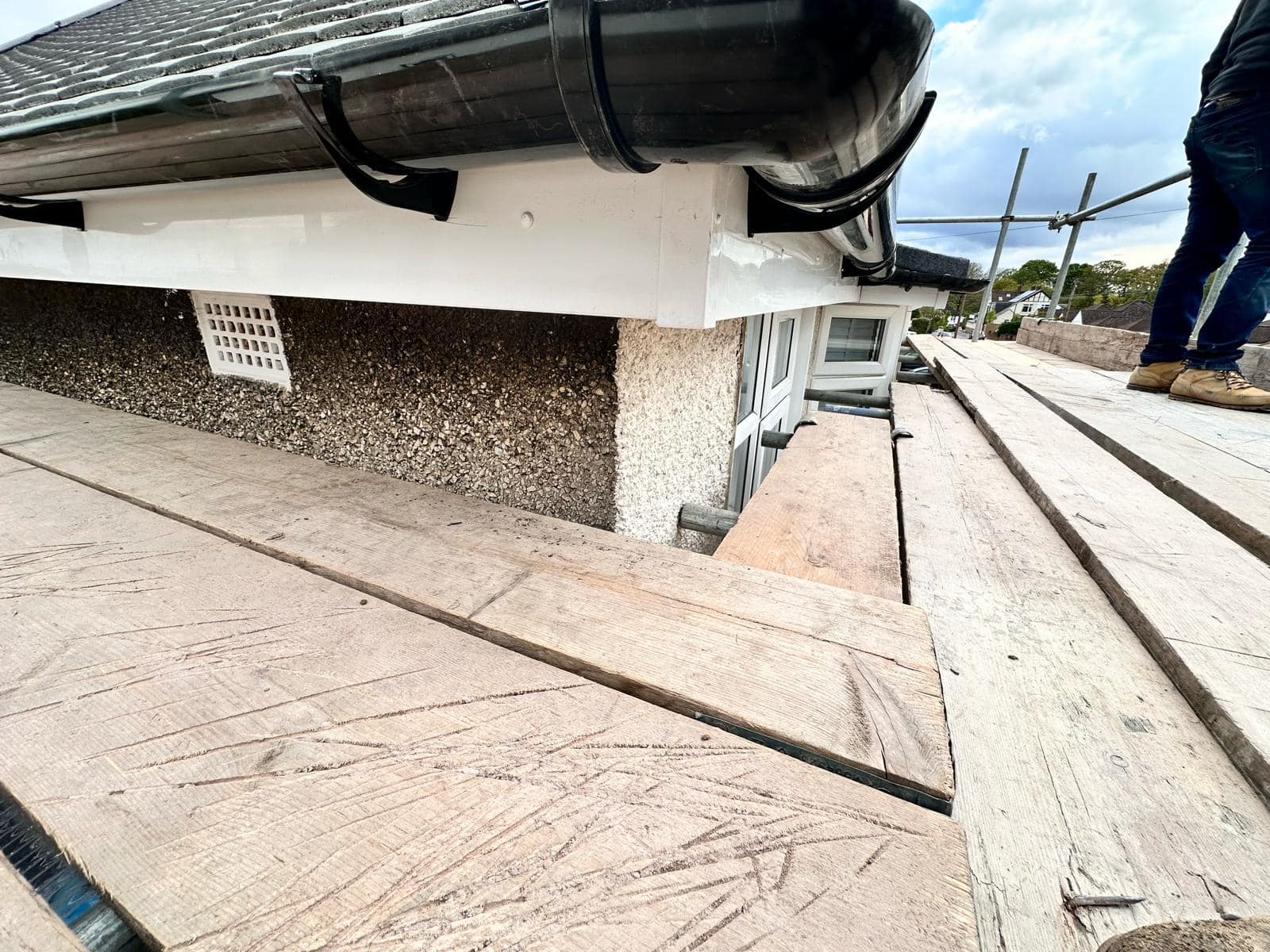 Professional roofers working on a property in London - KS Roof Master