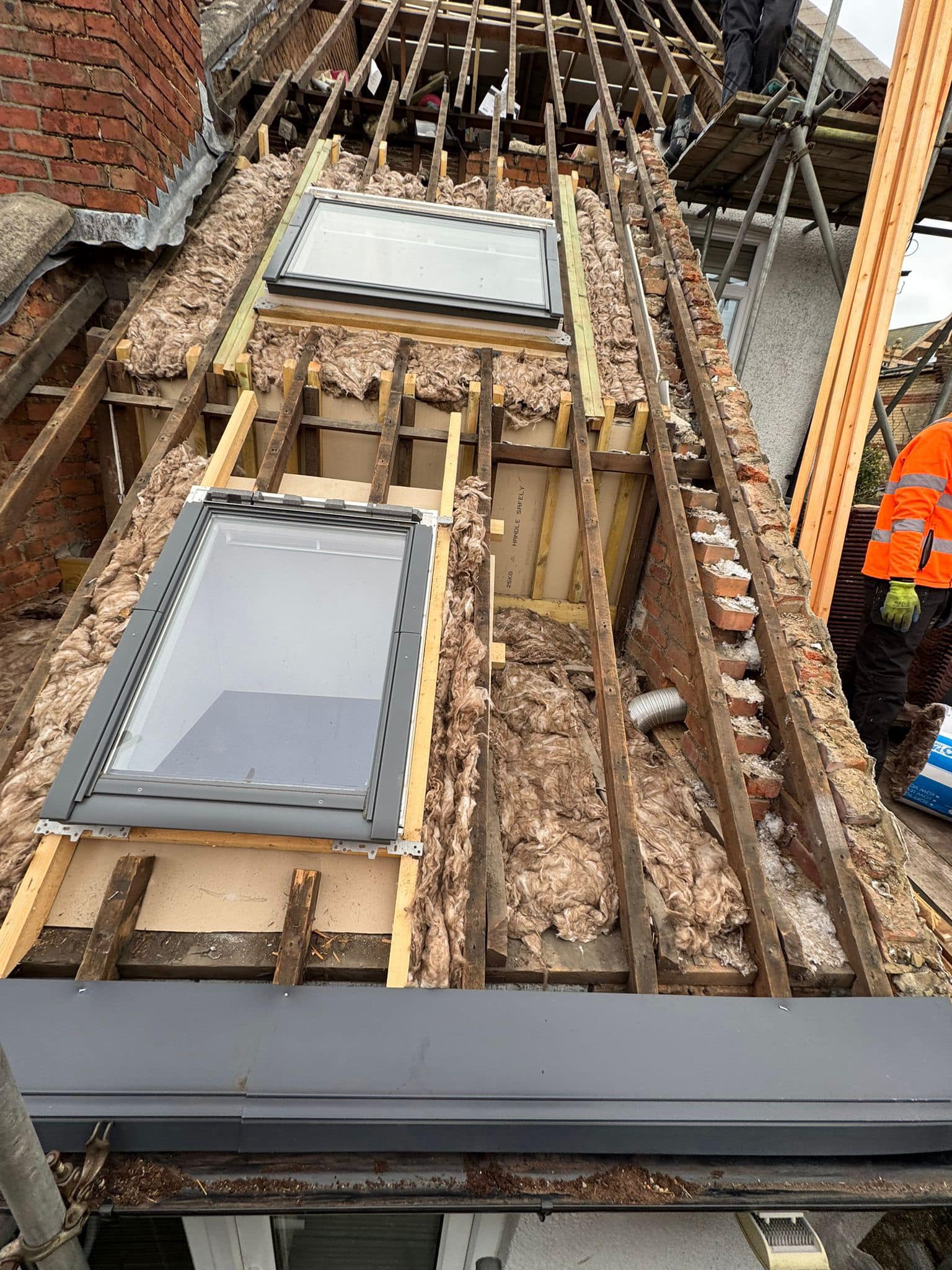 Professional roofers working on a property in London - KS Roof Master