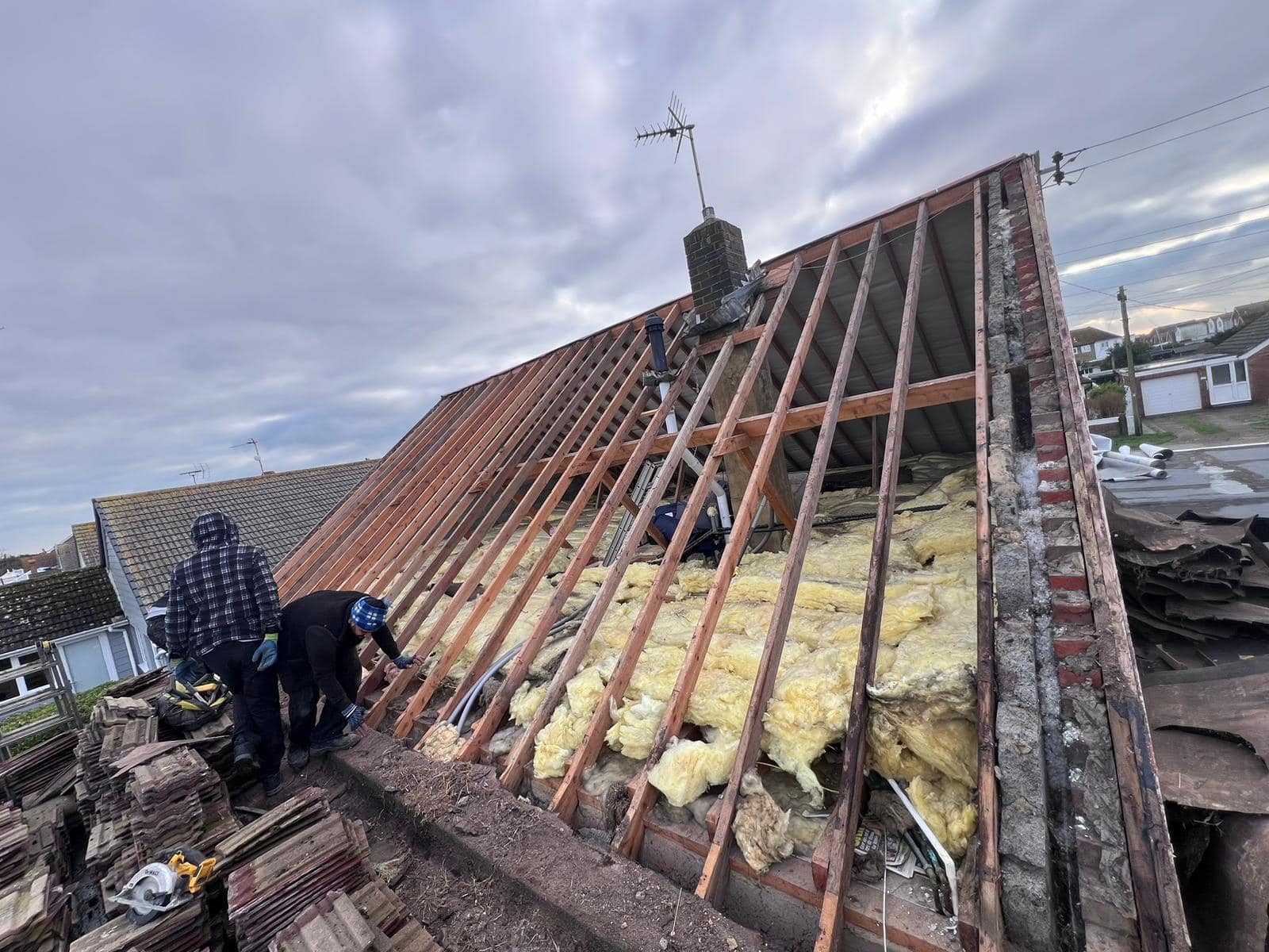 Professional roofers working on a property in London - KS Roof Master