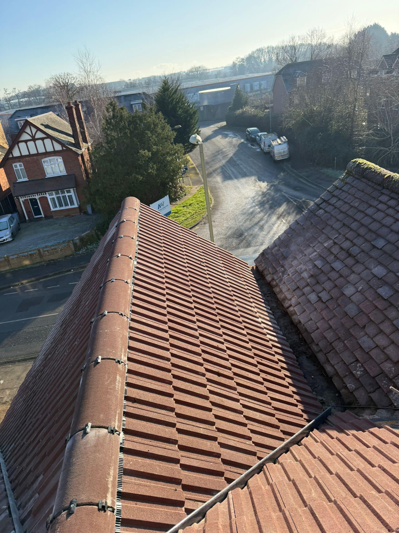 Professional roofers working on a property in London - KS Roof Master