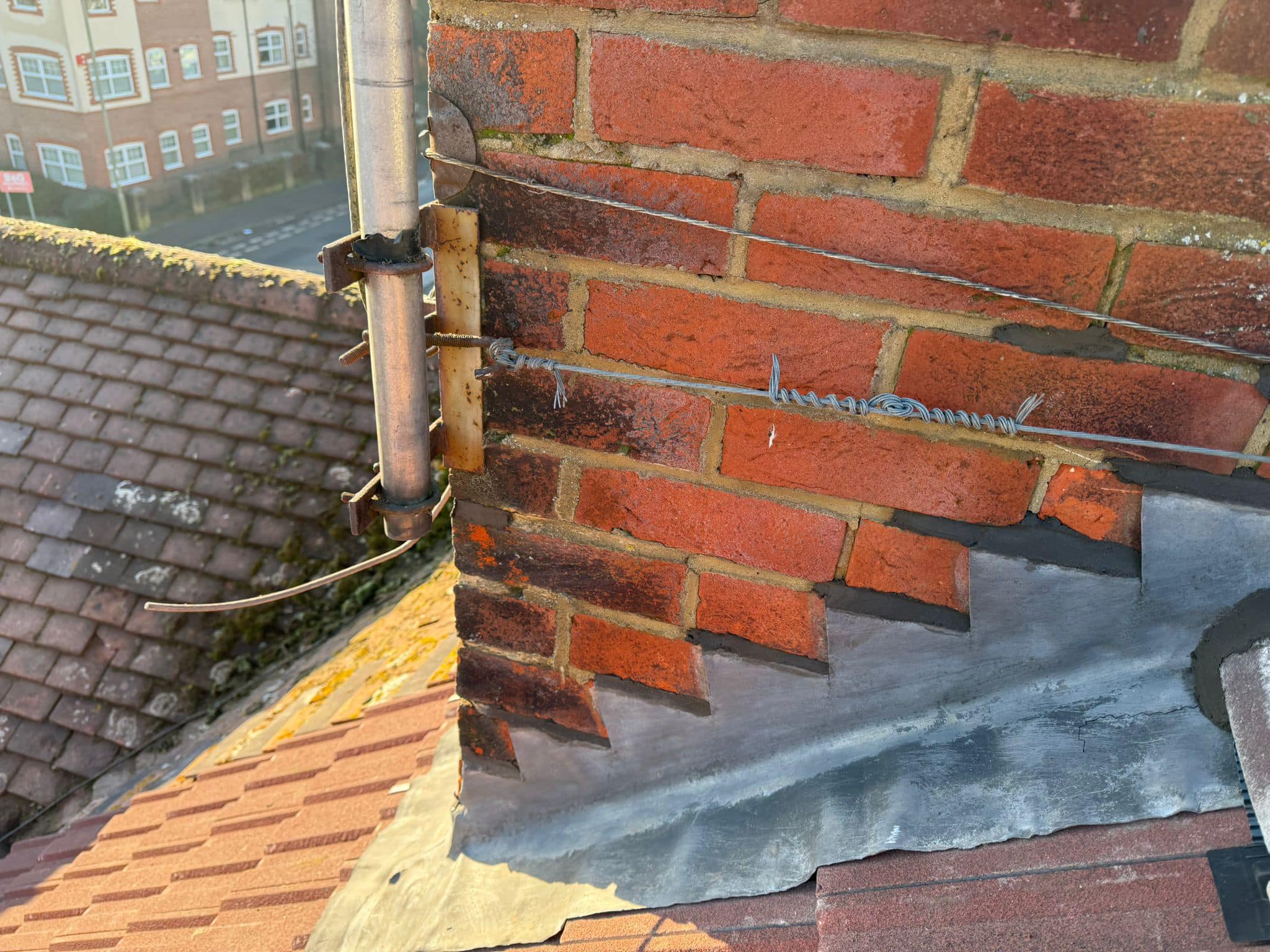 Professional roofers working on a property in London - KS Roof Master