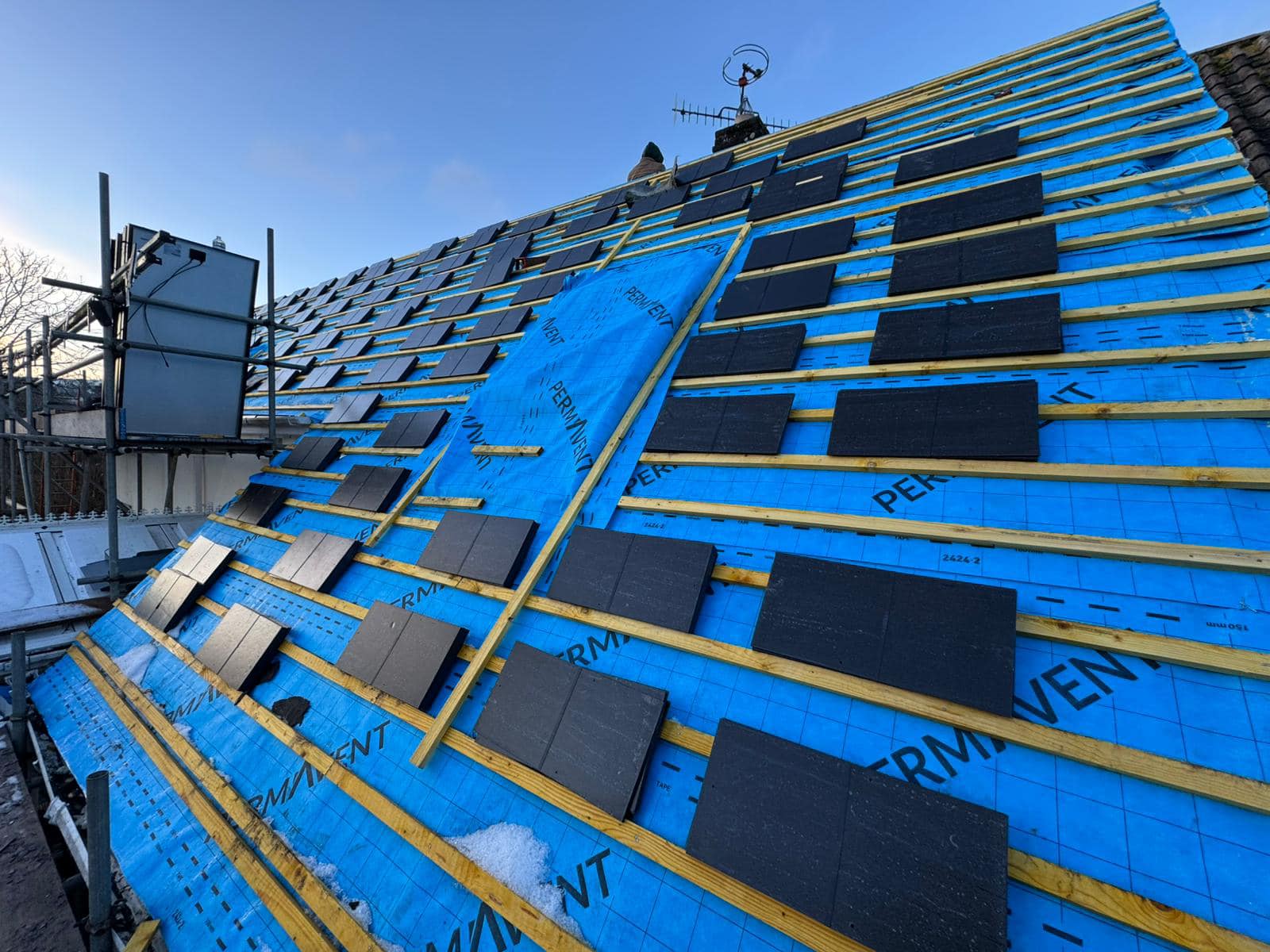 Professional roofers working on a property in London - KS Roof Master