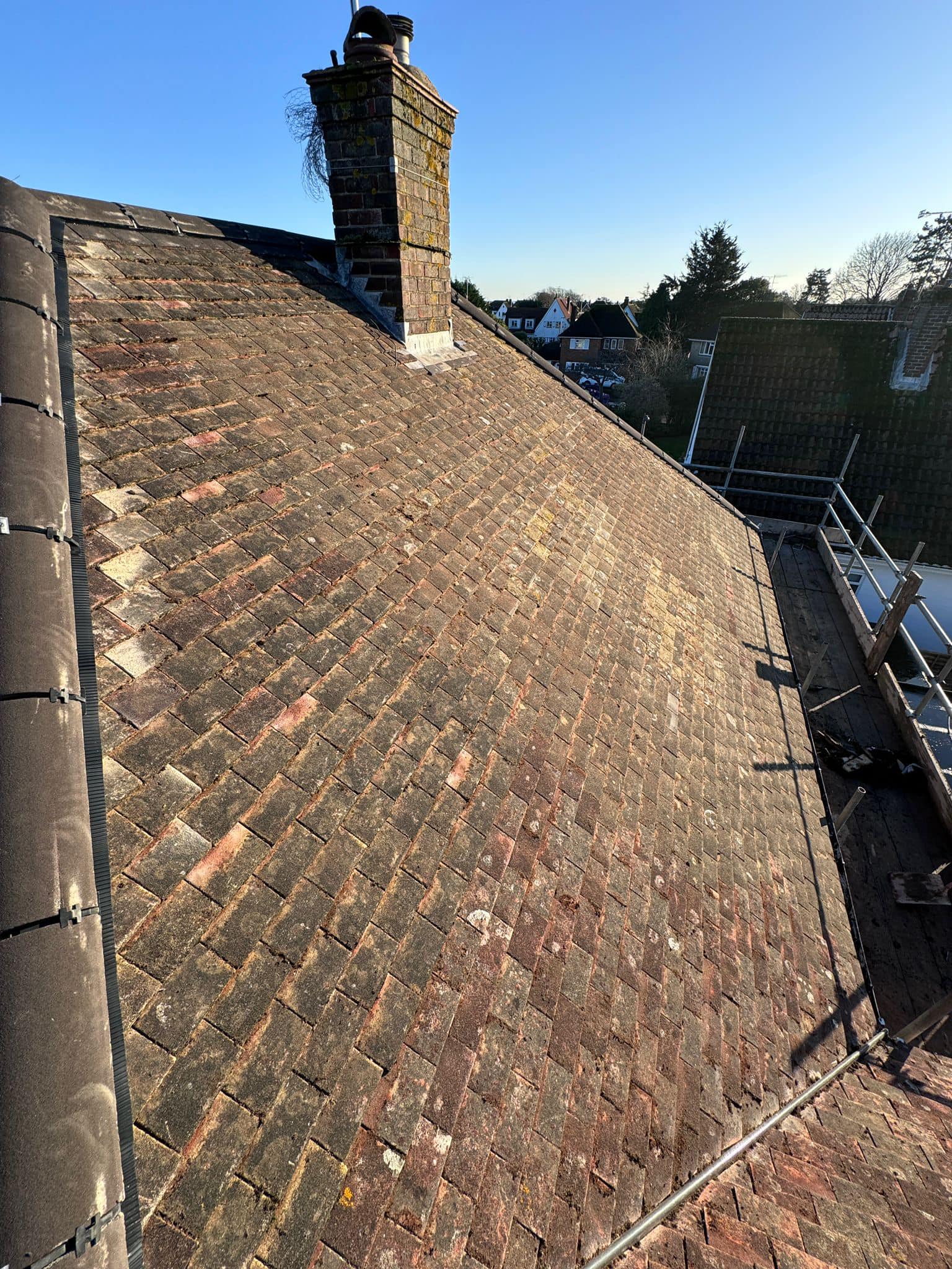 Professional roofers working on a property in London - KS Roof Master