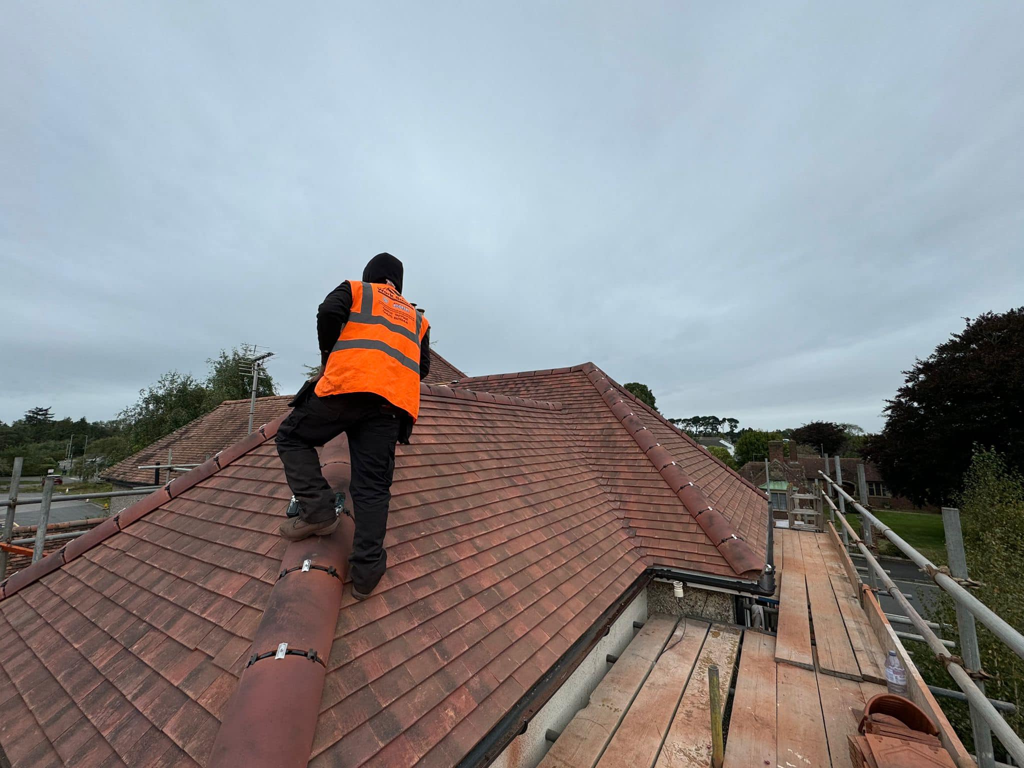 Professional roofers working on a property in London - KS Roof Master